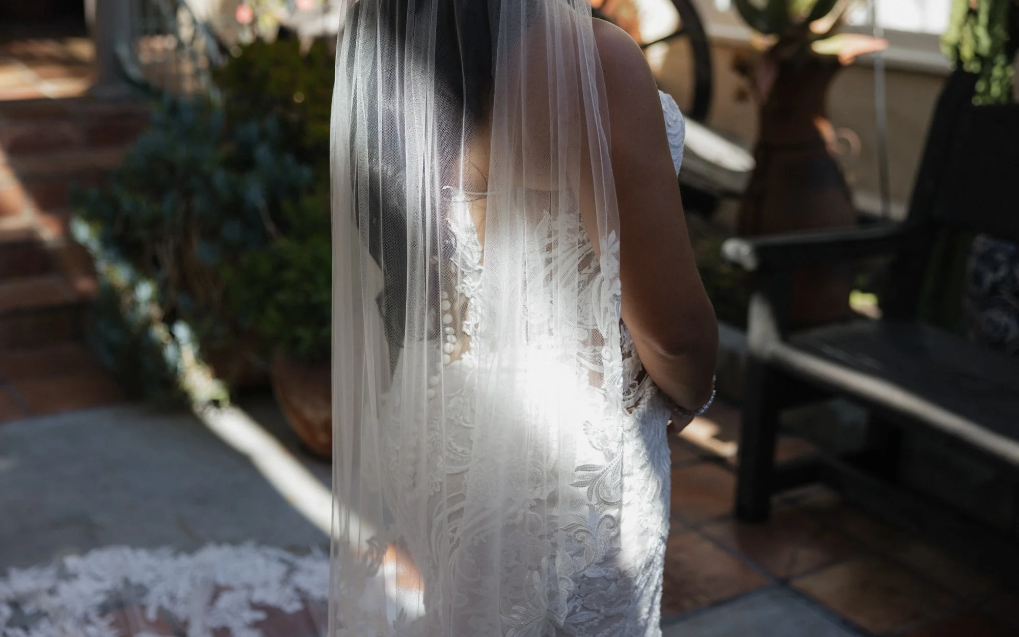 Details of brides wedding dress in Santa Ana at the Green Parrot Villa