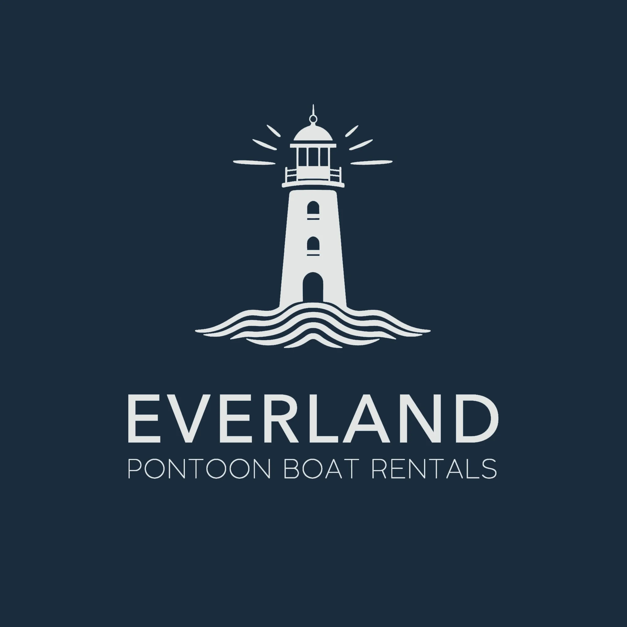 01 Everland Logo - Lighthouse (Grey on Navy).jpg