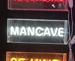 MANCAVE SIGN.jpg