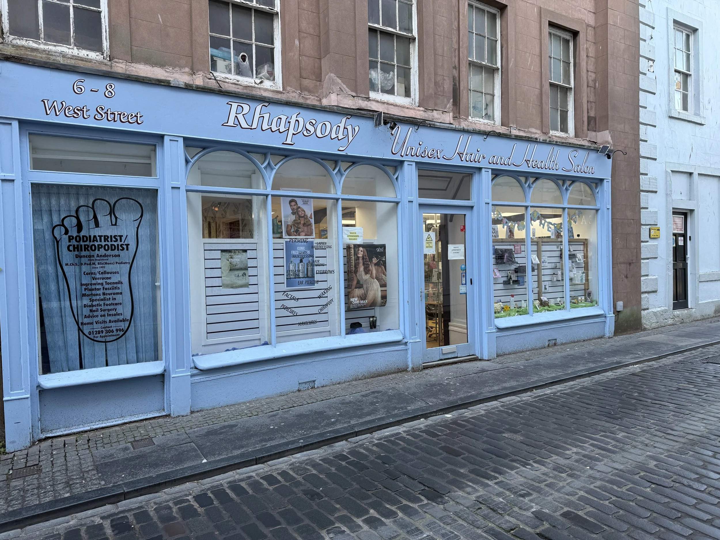 Rhapsody Unisex Hair &amp; Health Salon