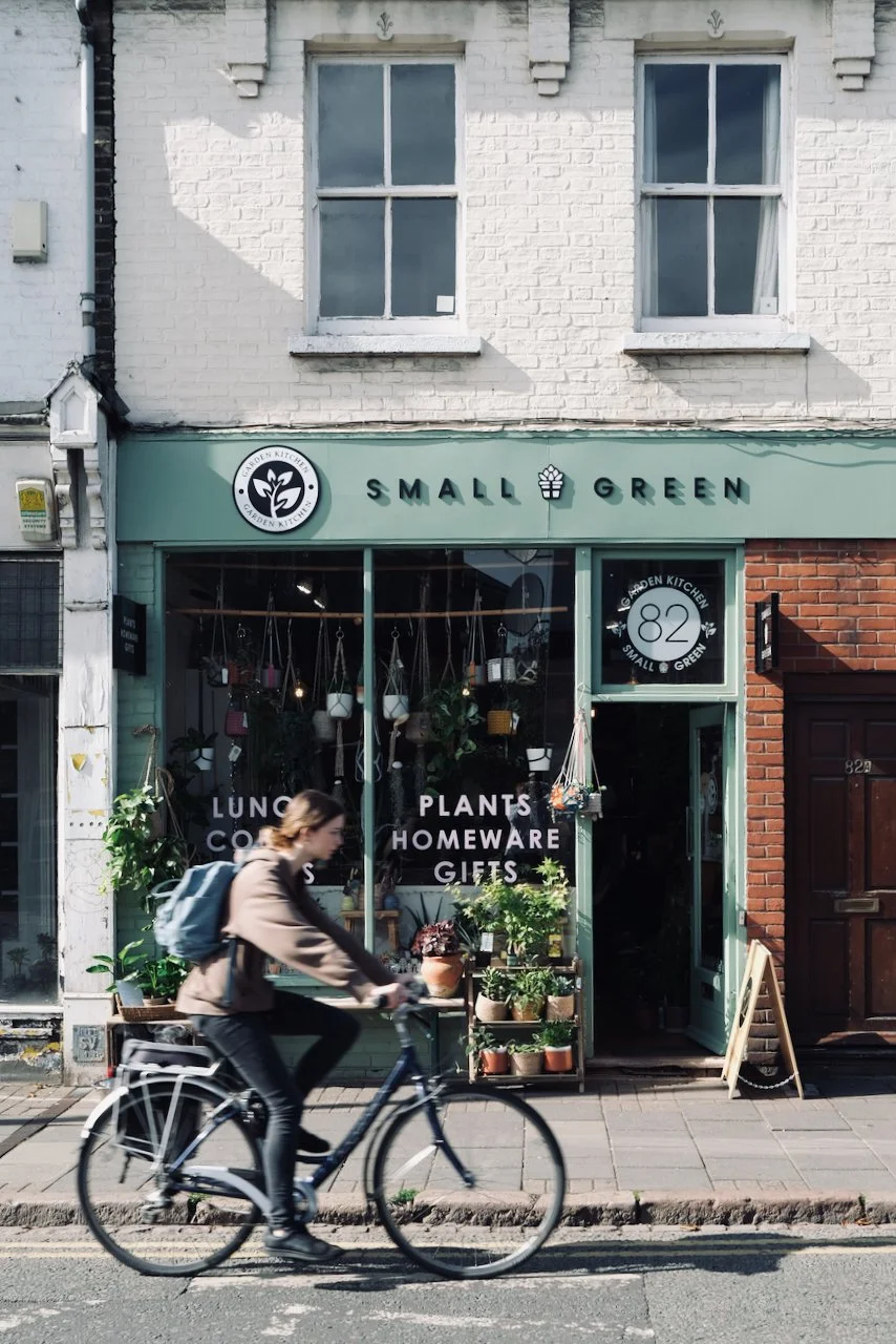 Small and Green houseplant shop with green storefront on Cambridge Mill Road