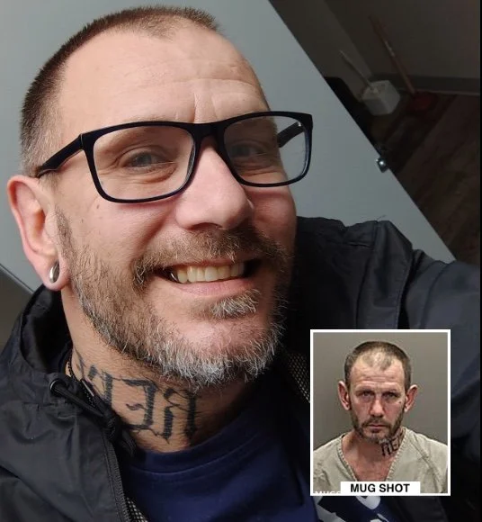 A smiling man with glasses, a beard, and tattoos posing indoors, with a mug shot of the same man in the corner showing a serious expression.