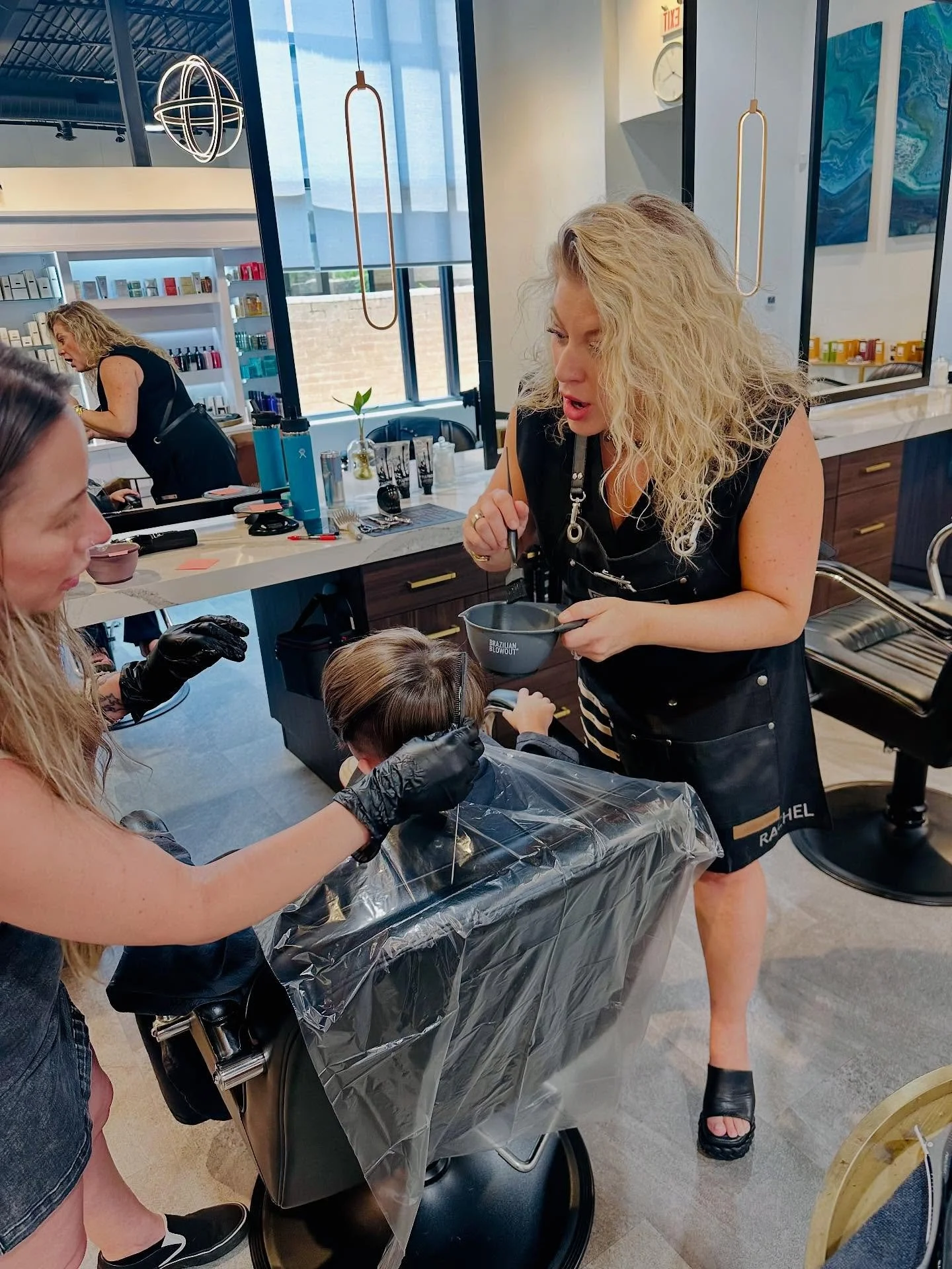 Just your average Monday… or is it? 
It’s a fun day at Hyde when your boss rolls out as your co-stylist, “Rachel”. It’s all hands on deck when creativity is flowing, even our owner jumps in when a little help (or fun)