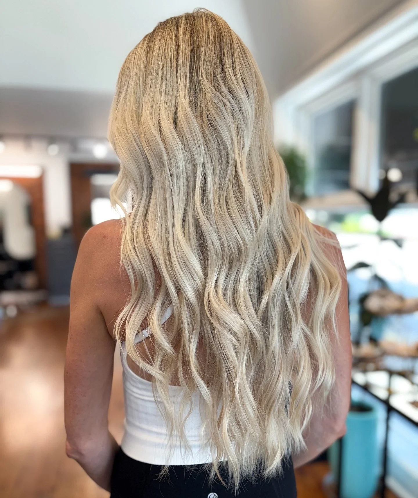Long blonde hair that’s as healthy as it is stunning?
We use Goldwell color—gentle on your hair, powerful in results. It lifts beautifully while keeping your hair strong, shiny, and safe.
Healthy, high-impact blondes start here. That&rs
