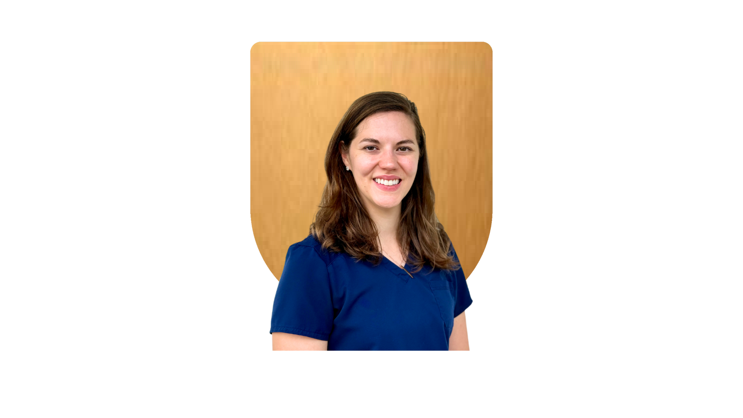 Smiling woman with long hair in a teal sweater against a gold background.