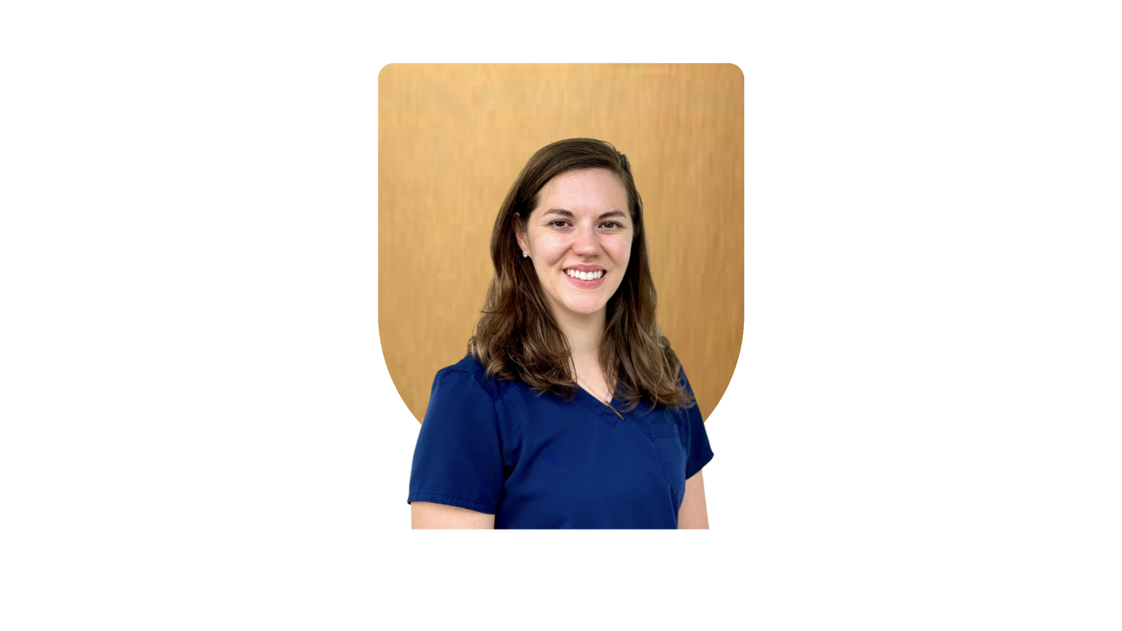 Smiling woman with long hair wearing a teal sweater and necklace against a gold background.