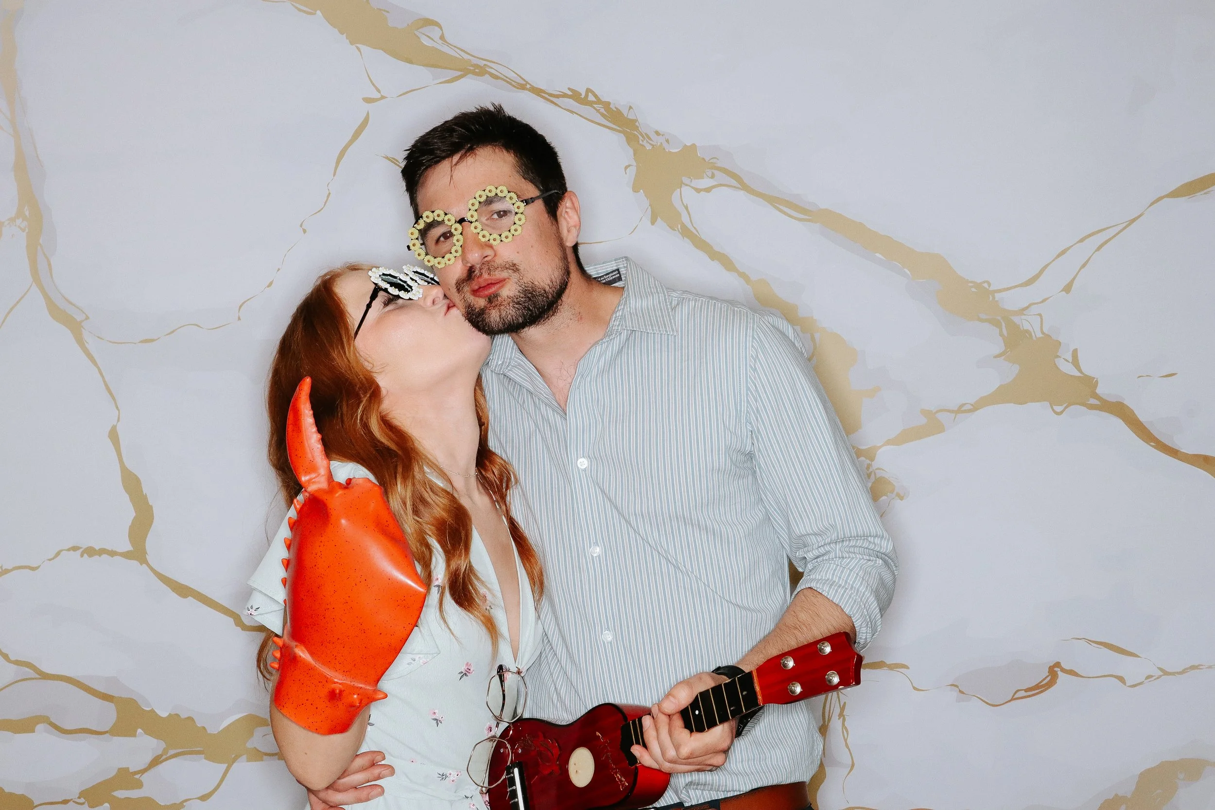 Two people using photo booth.jpg