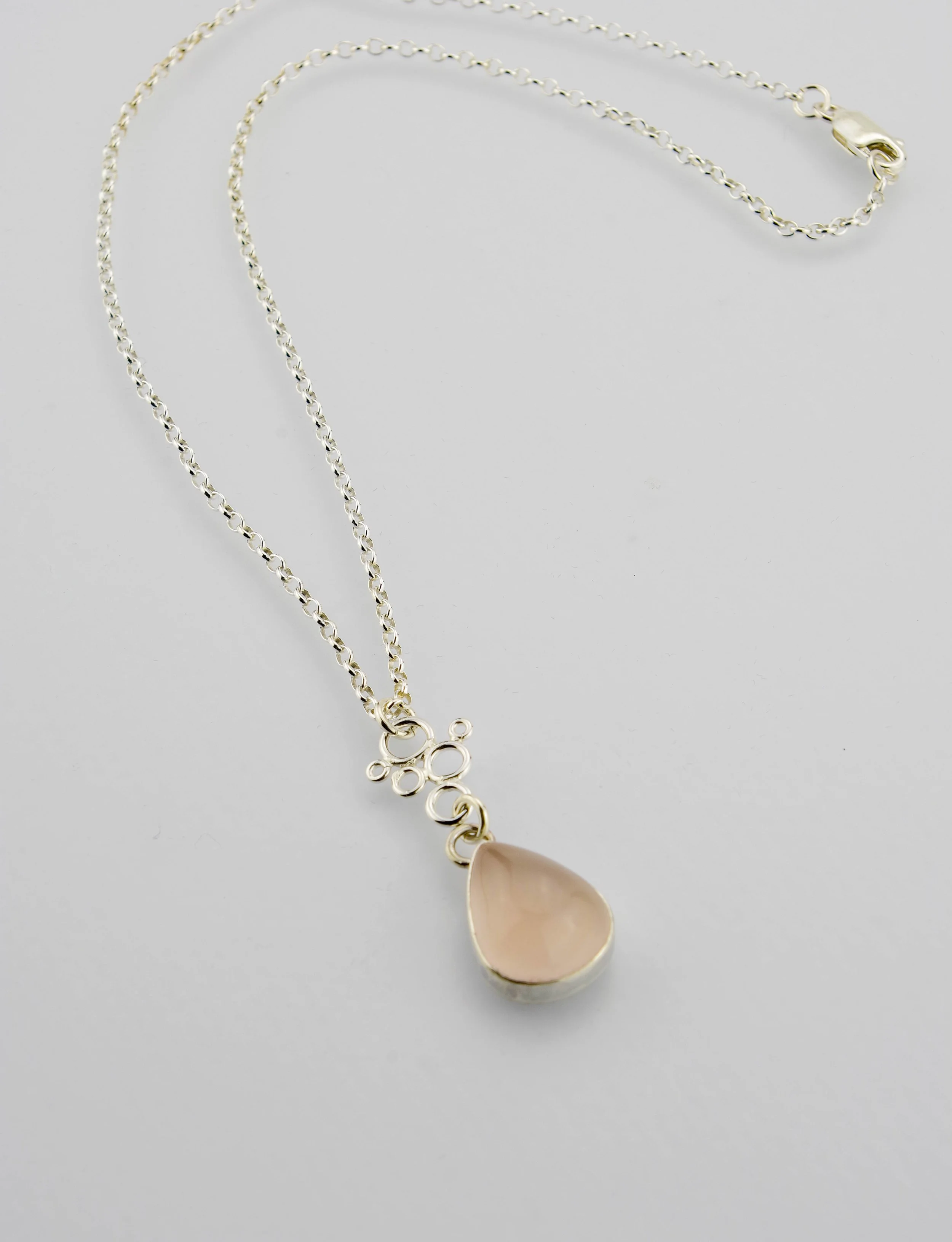 Rose quartz pear bubble bail.jpg