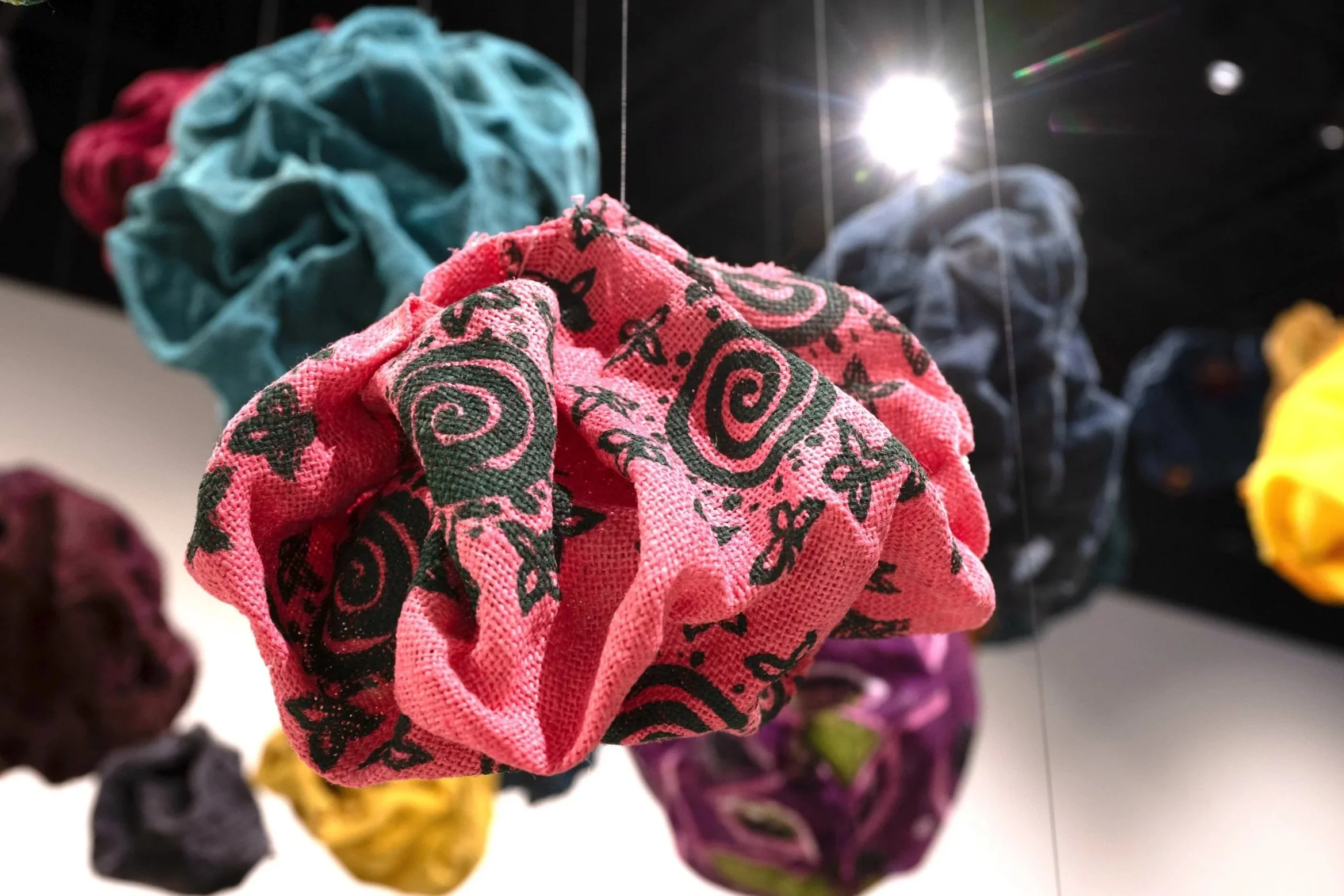 Close up of installation forms with screen printed uli motifs..