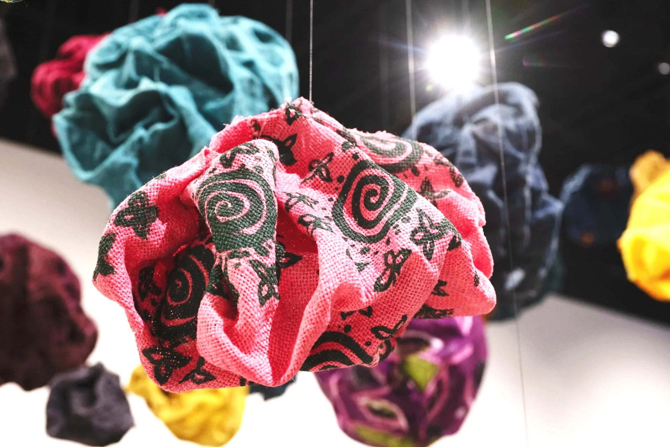 Close up of installation forms with screen printed uli motifs..