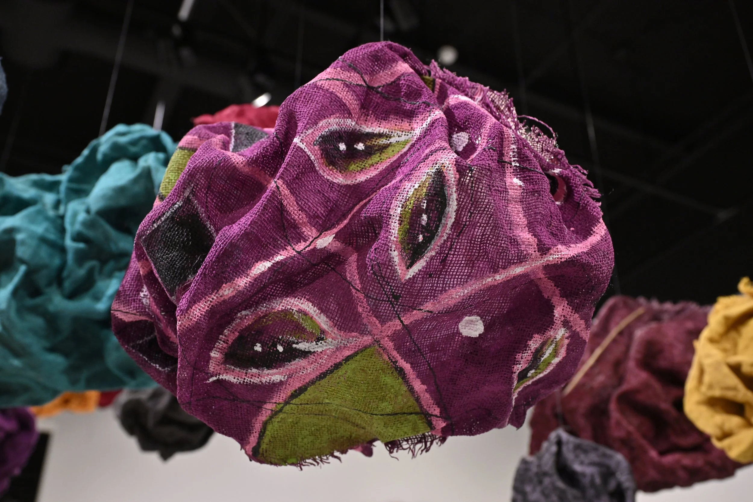 Close up of installation forms with hand painted designs.