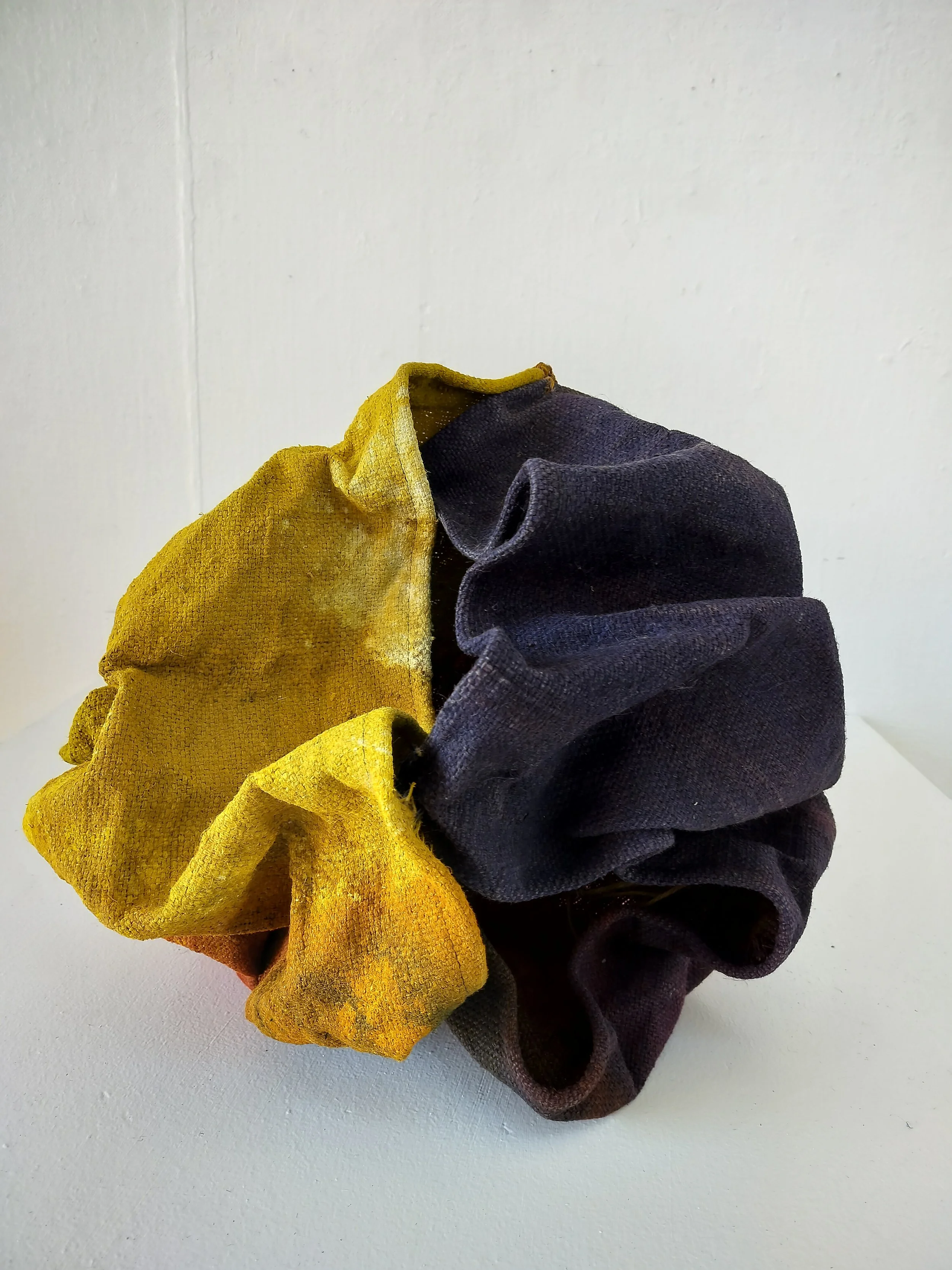 Metamorphosis, 2023. Used jute sack, dyes, acrylic paint, and binding wire. 