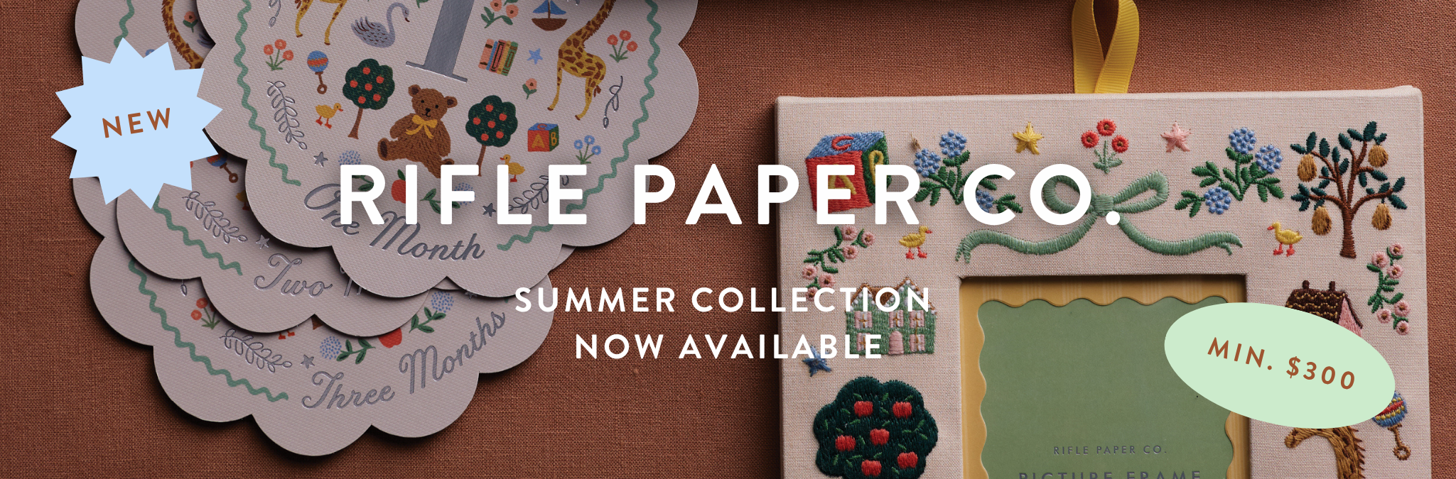 Colorful paper and embroidered picture frames with children's illustrations and text promoting Rifle Paper Co.'s summer collection, with a prominent 'NEW' label and minimum price of $300.