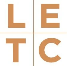 A 2x2 grid with the words 'LET' and 'C' in brown letter blocks under white backgrounds.