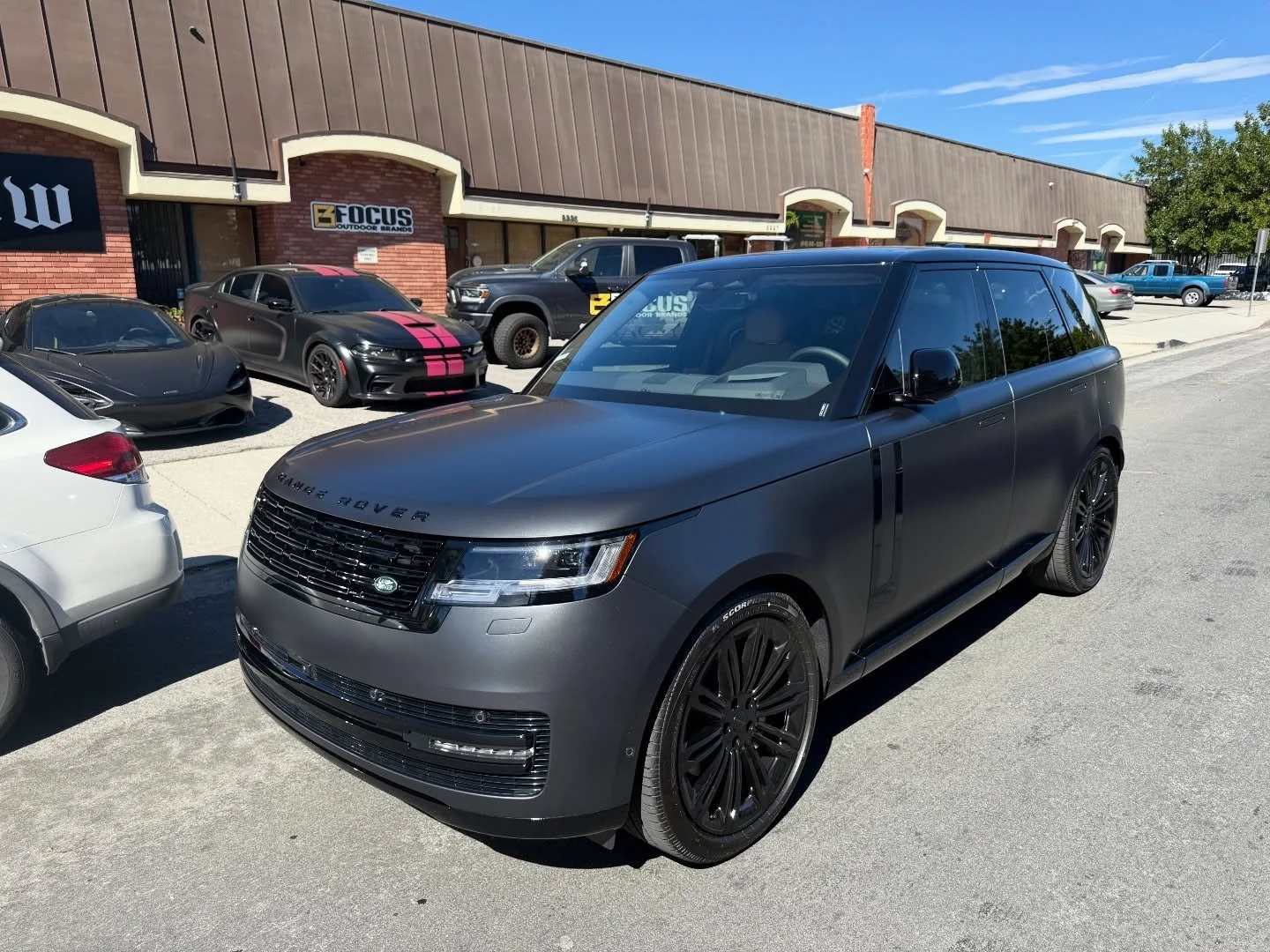 Range Rover in for a full Stealth PPF &amp; gloss black painted grille, emblems and accents&hellip; #ezw #eziewraps #rangeroversport #stealthppf #ppf