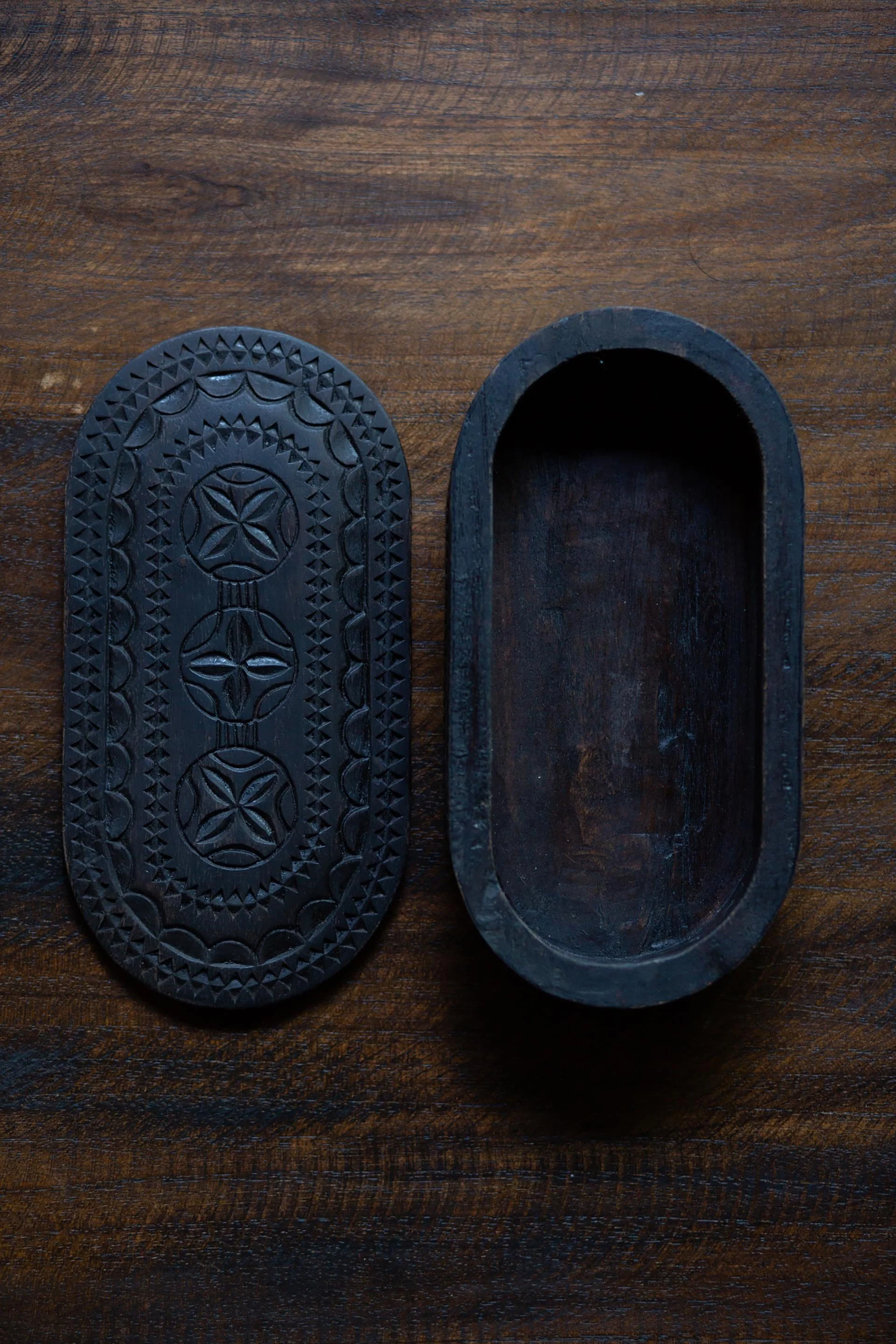 close-up of wooden box with lid and body side by side