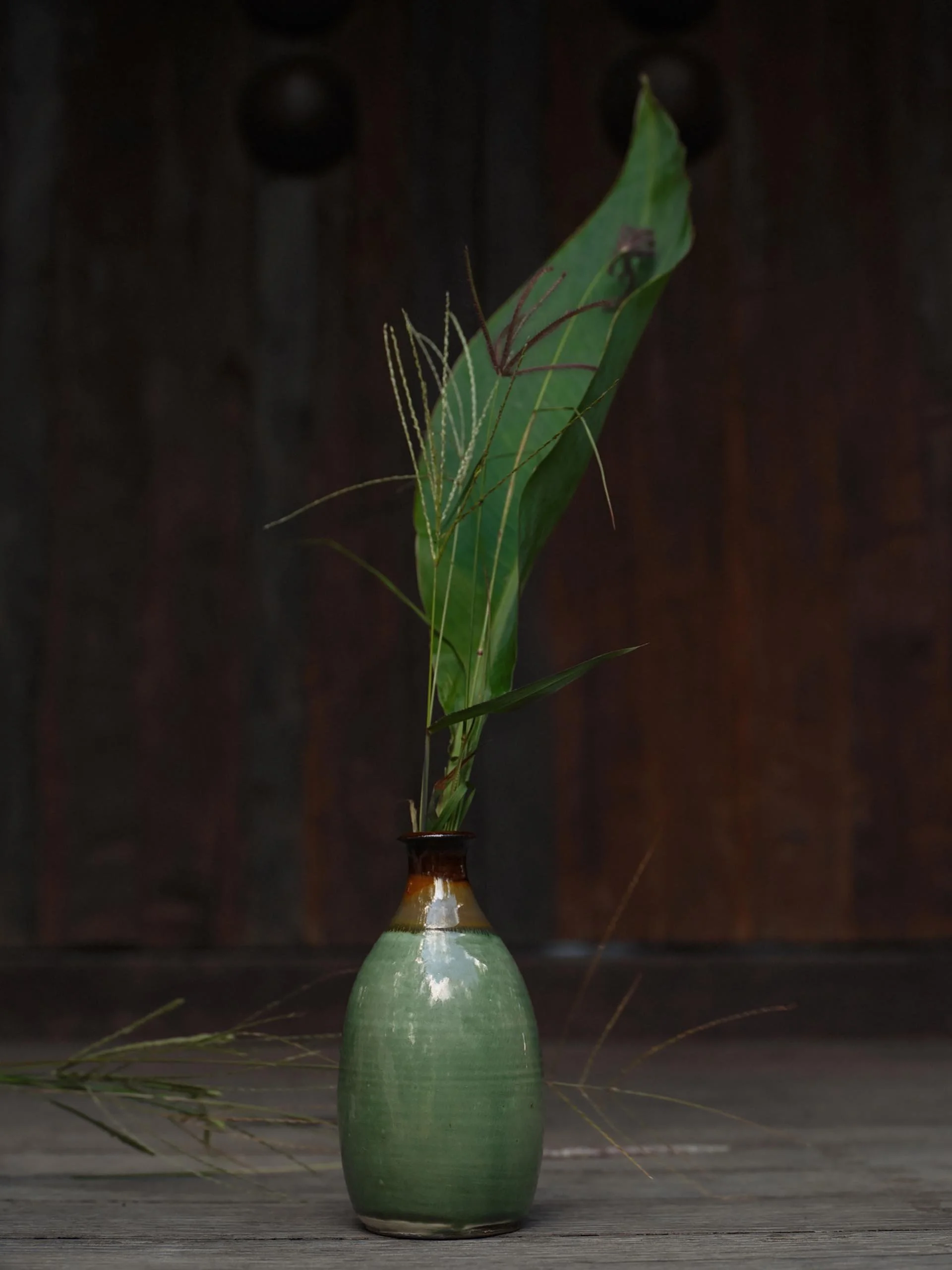 Green Own a soft green glazed vase or bottle, handmade in Onta. Designated Intangible Property of Japan.