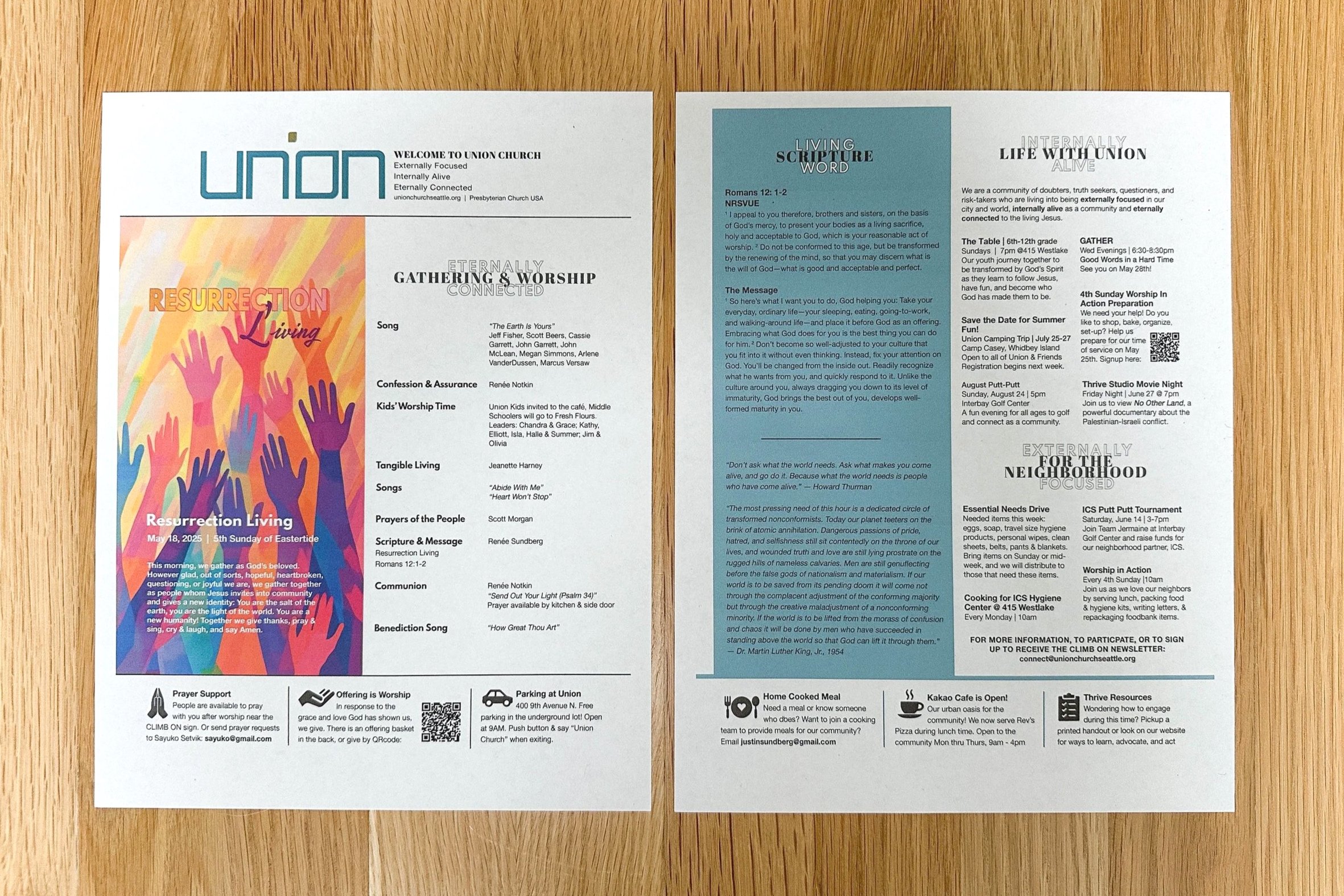 Two church event flyers on a wooden surface. The left flyer promotes a Resurrection Living event with colorful hands graphic and a schedule of songs, prayer, message, and communion. The right flyer provides church information, including scripture, activities, and community resources, with light blue and white backgrounds.