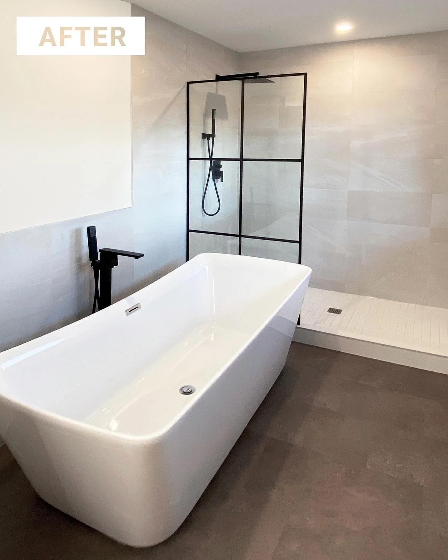 Hooray for another completed bathroom! 🛀 This small bedroom + regular-sized bathroom has been transformed into one large bathroom space equipped with oversized freestanding soaker tub, large shower with glass partition, black hardware accents throug