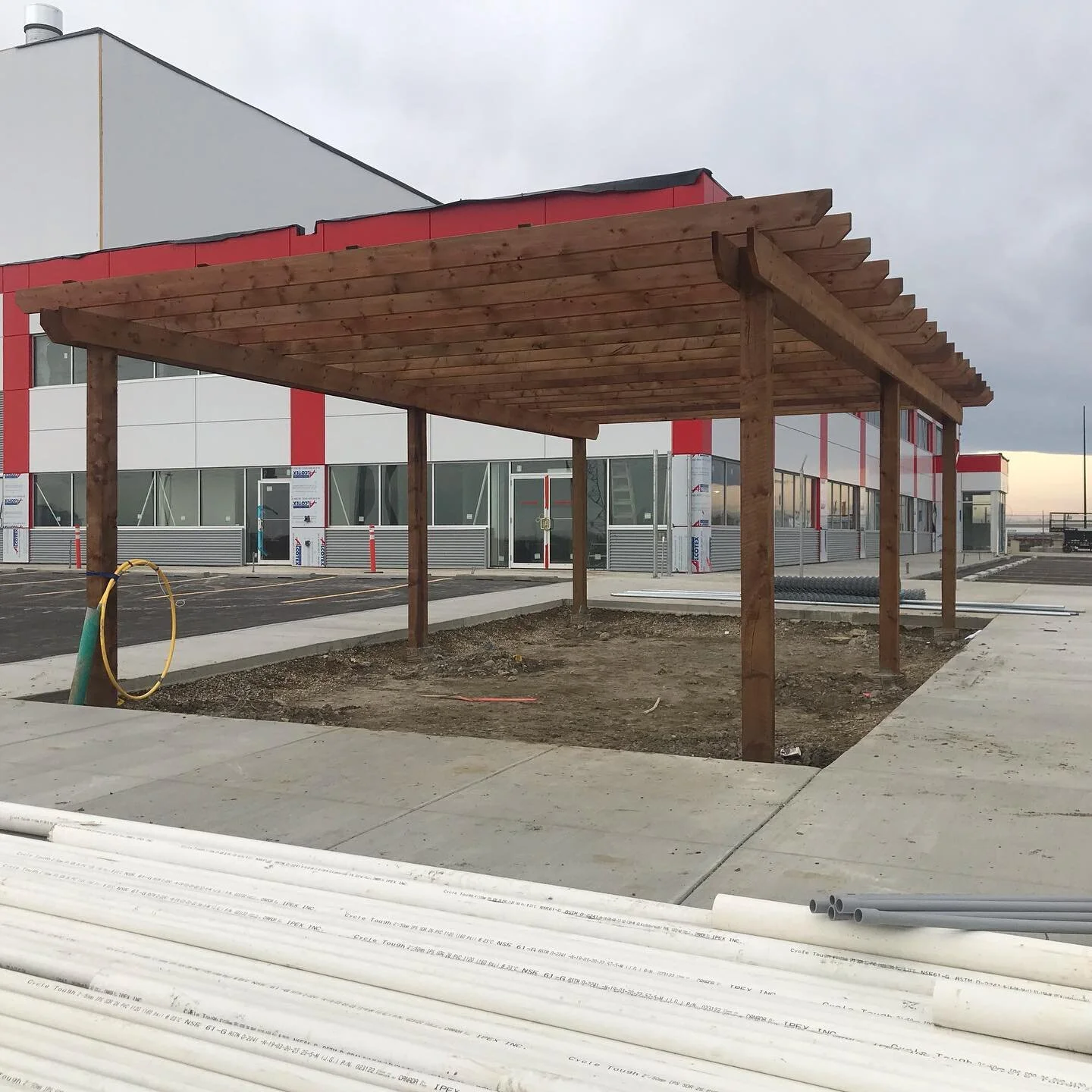We just finished up this massive pergola our front of the new Alta link building in the SE. #pergola #yyccontractor