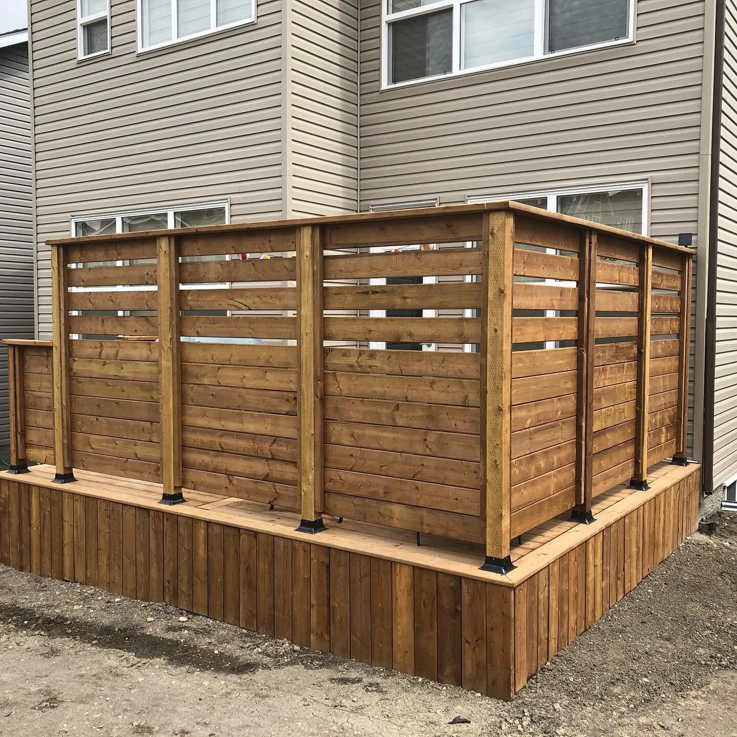 Completed a new deck including a 6&rsquo; privacy wall. Time to get out and enjoy the summer!! #outdoorliving #deckdesign #yycconstruction #summerliving #outdoorlivingspace #yyc
