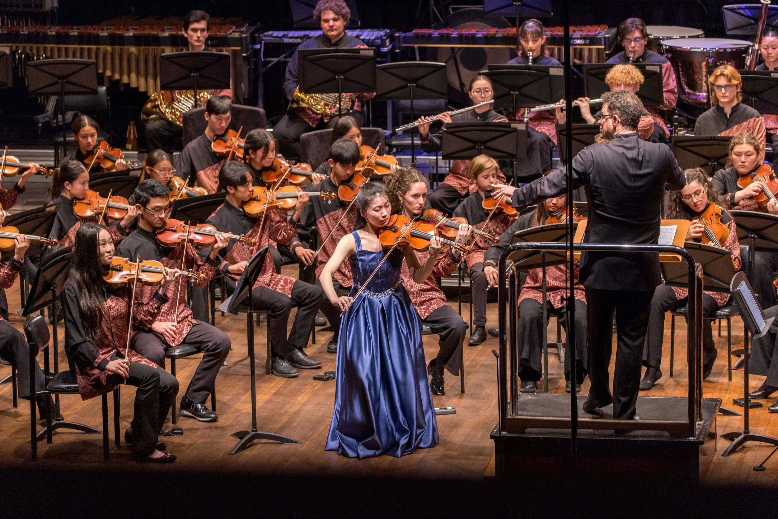 2025 competition winner Sharon Zhao performing with an orchestra