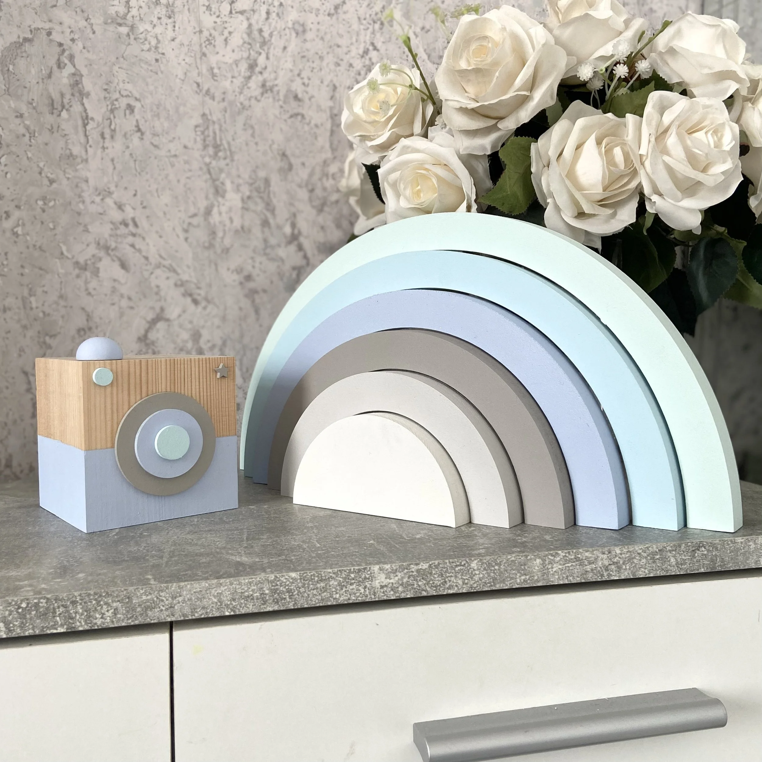 blue nursery rainbow.jpeg