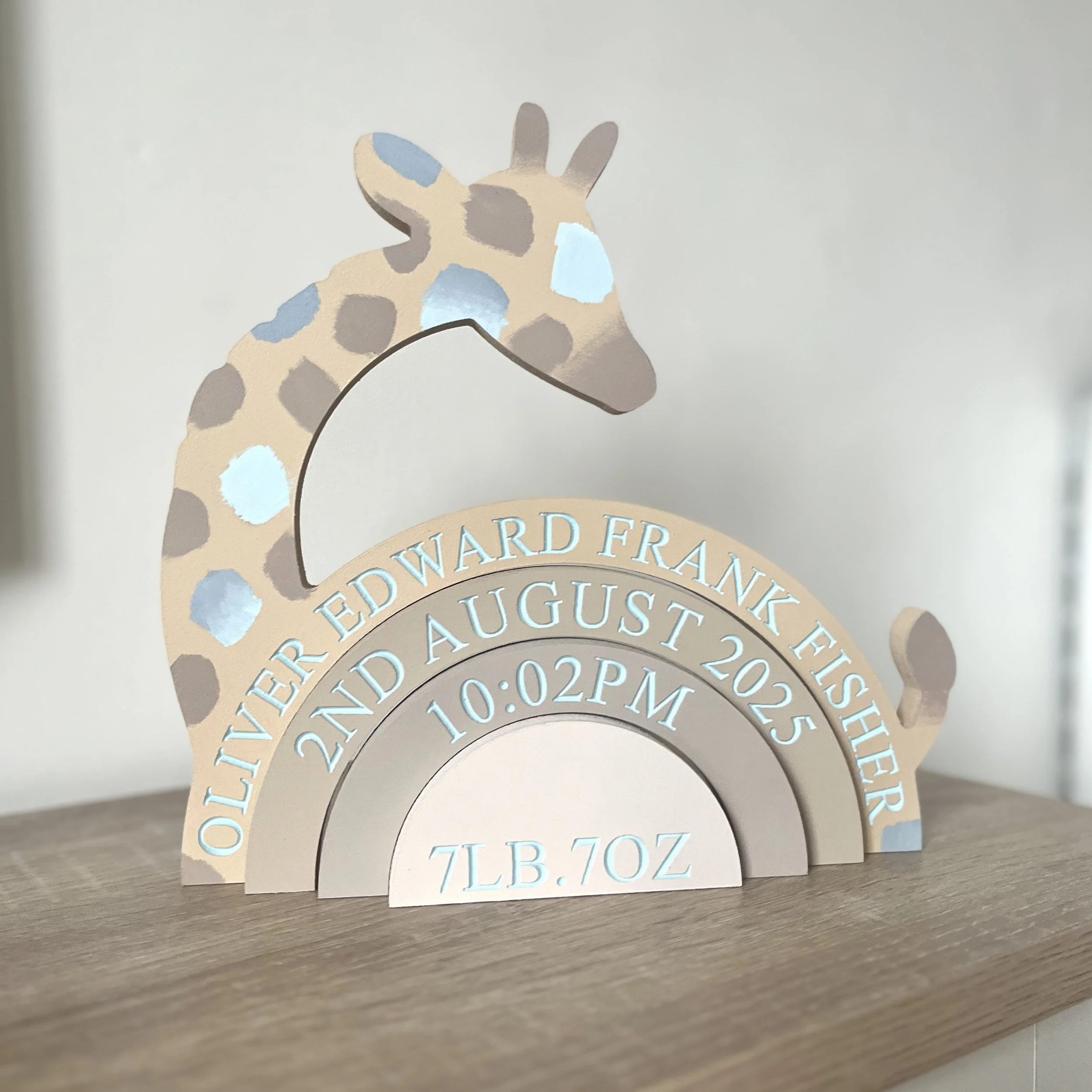 baby blue giraffe nursery.jpeg