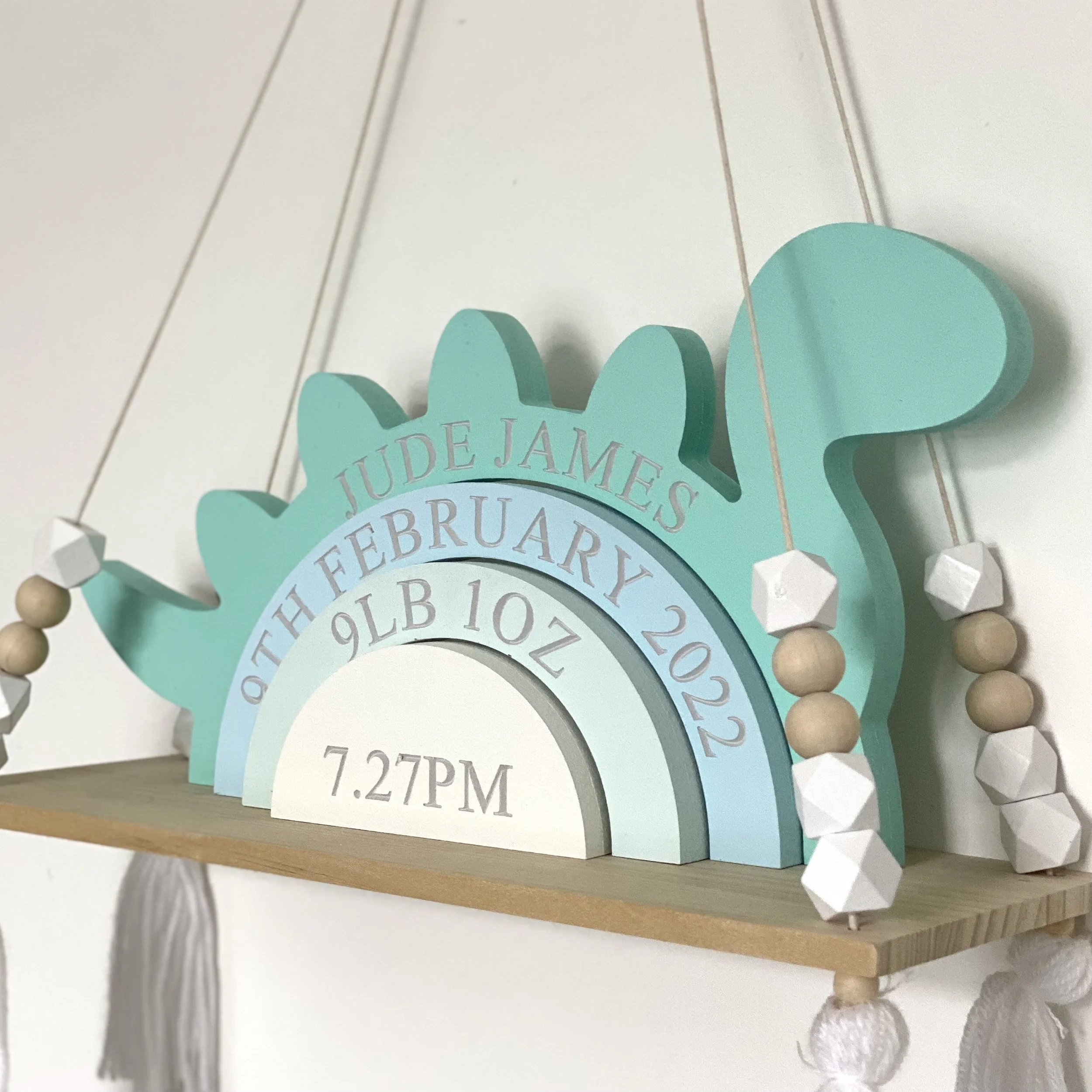 Turquoise dino nursery.jpeg