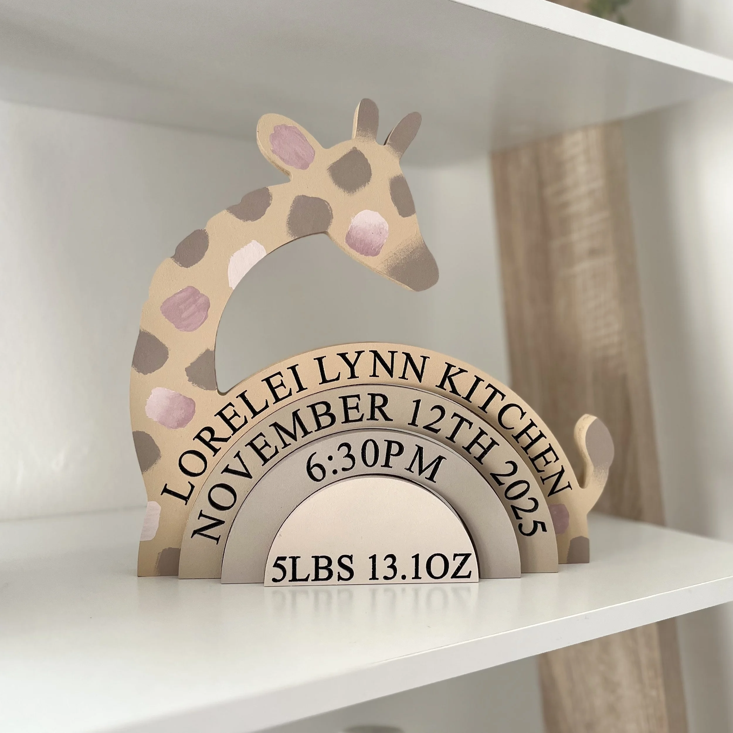 giraffe nursery with pink spots.jpeg