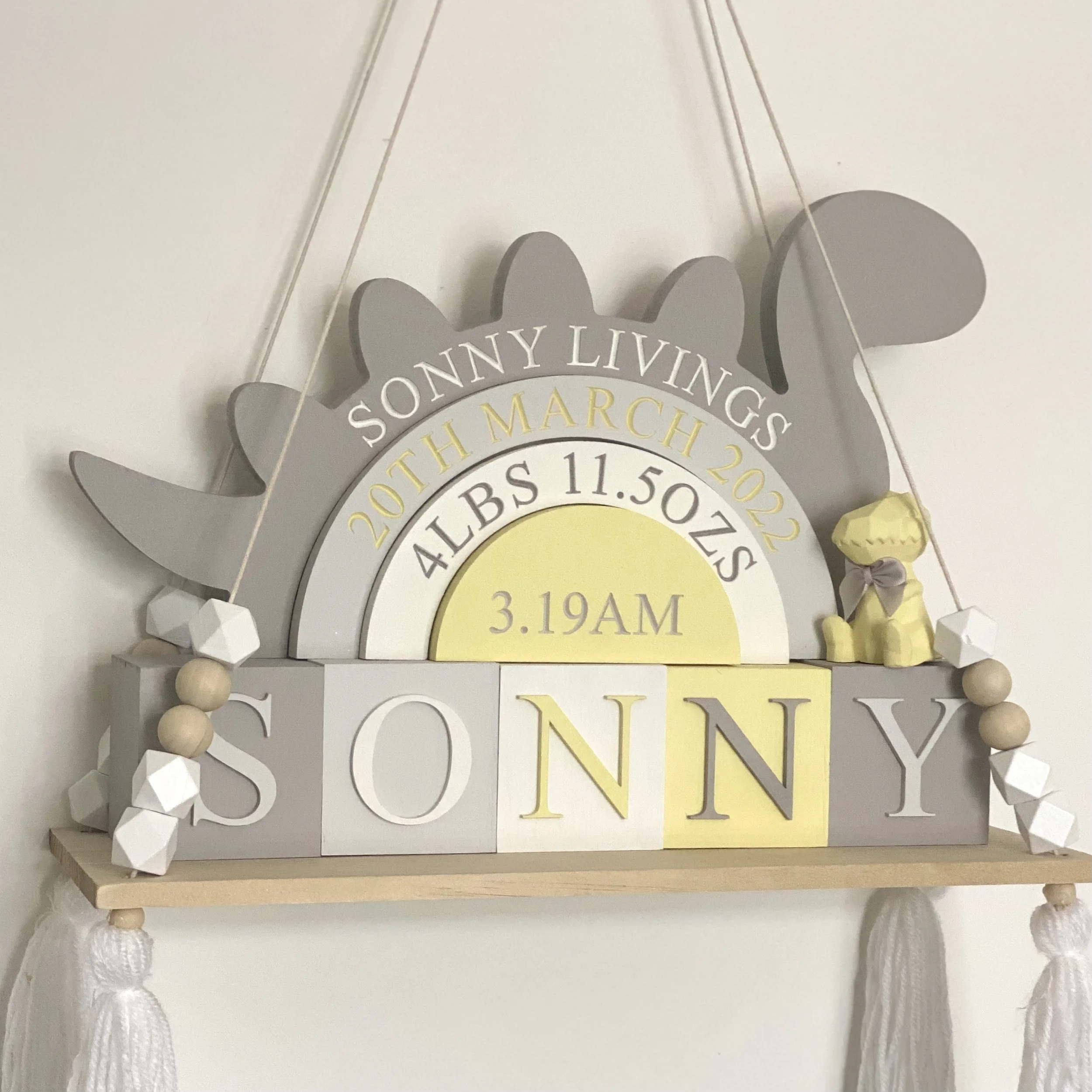 grey lemon dinosaur nursery.jpeg