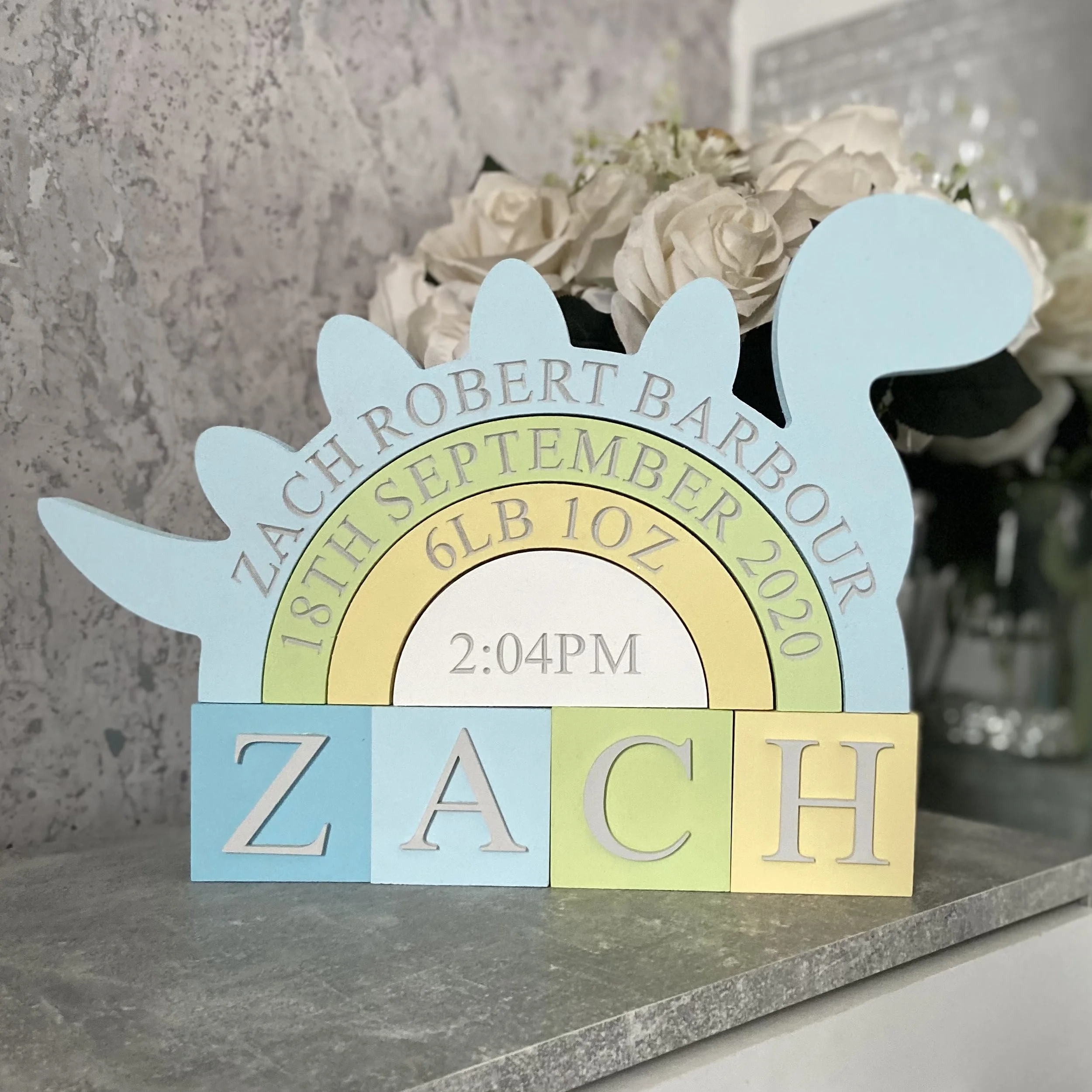 blue lemon dino nursery.jpeg