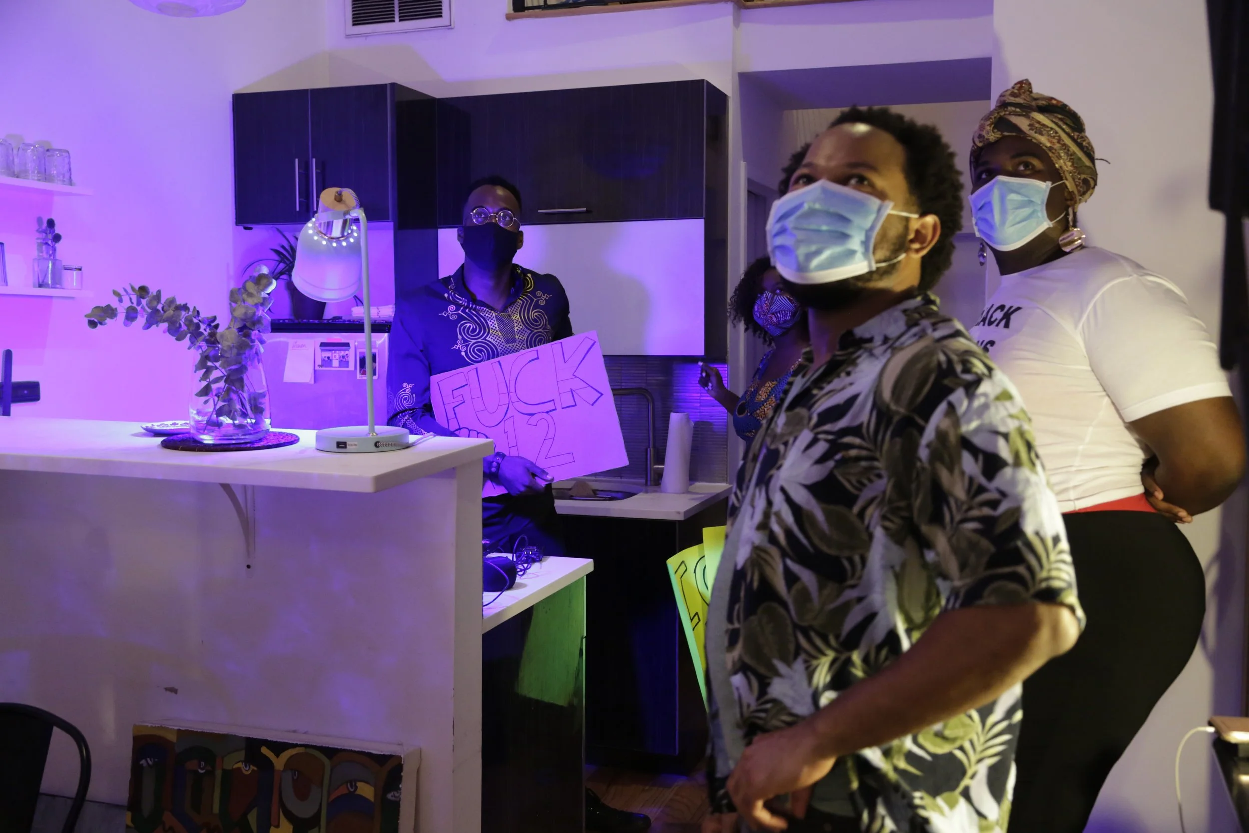 Trent Williams, Jarvis Matthews with Costume Designer, Qween Jean behind the scenes of the 4 Black People Breathing Peacefully for 5 Minutes.