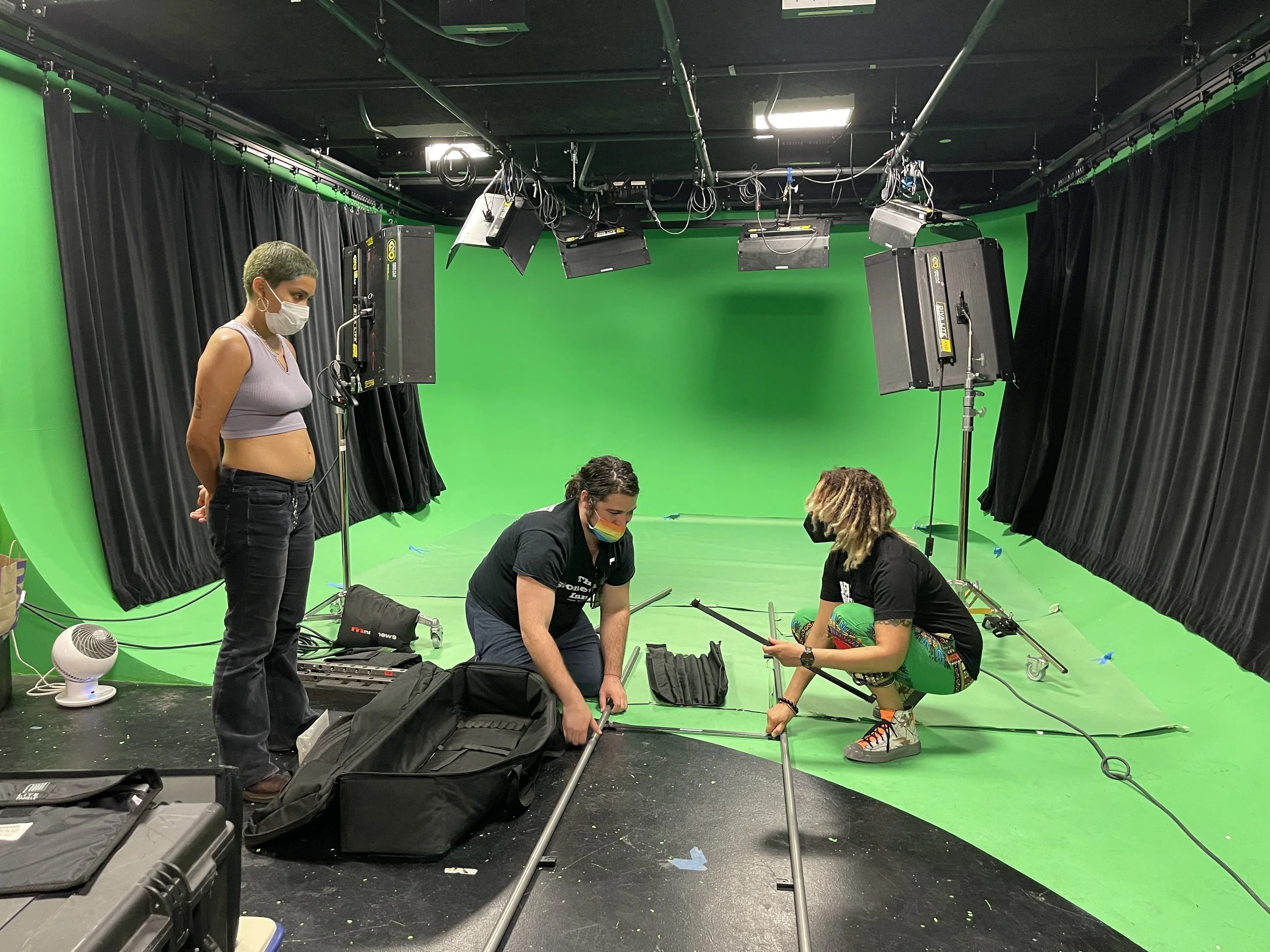 Ryan Grippi, Lin Que Ayoung, and Julie Lozano during green screen shoot.