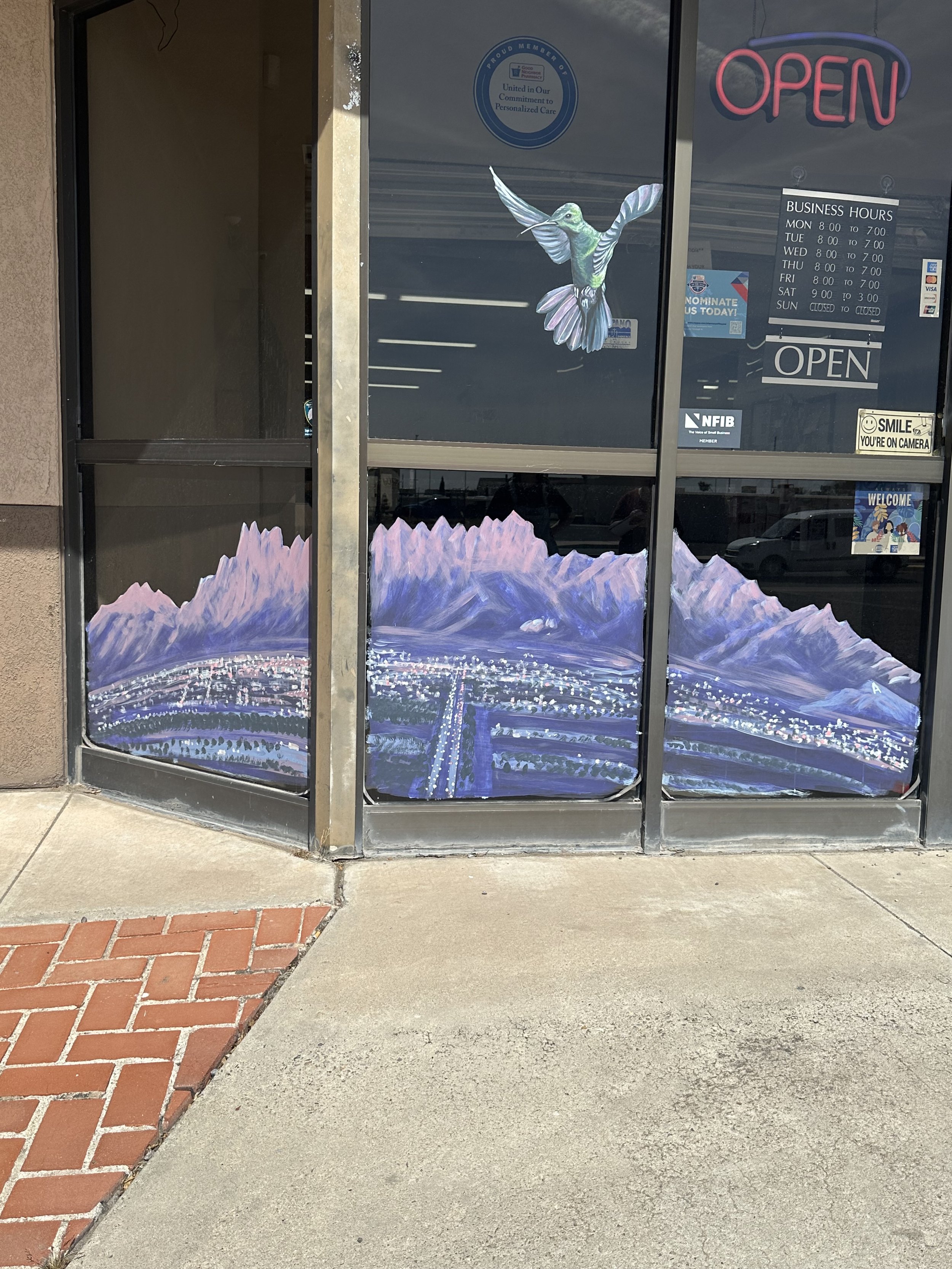 MainSt.WindowPaintingHummingbird.jpeg