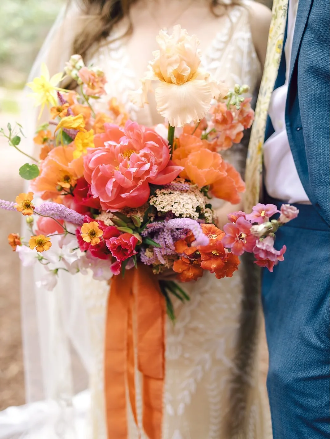 If you know me, you know I LOVE color 🌈 . So much fun creating these colorful florals for M &amp; A disco mushroom theme nuptials, thanks for trusting me to bring your vision to life! Moments perfectly captured by the ever talented @melissa_ergo