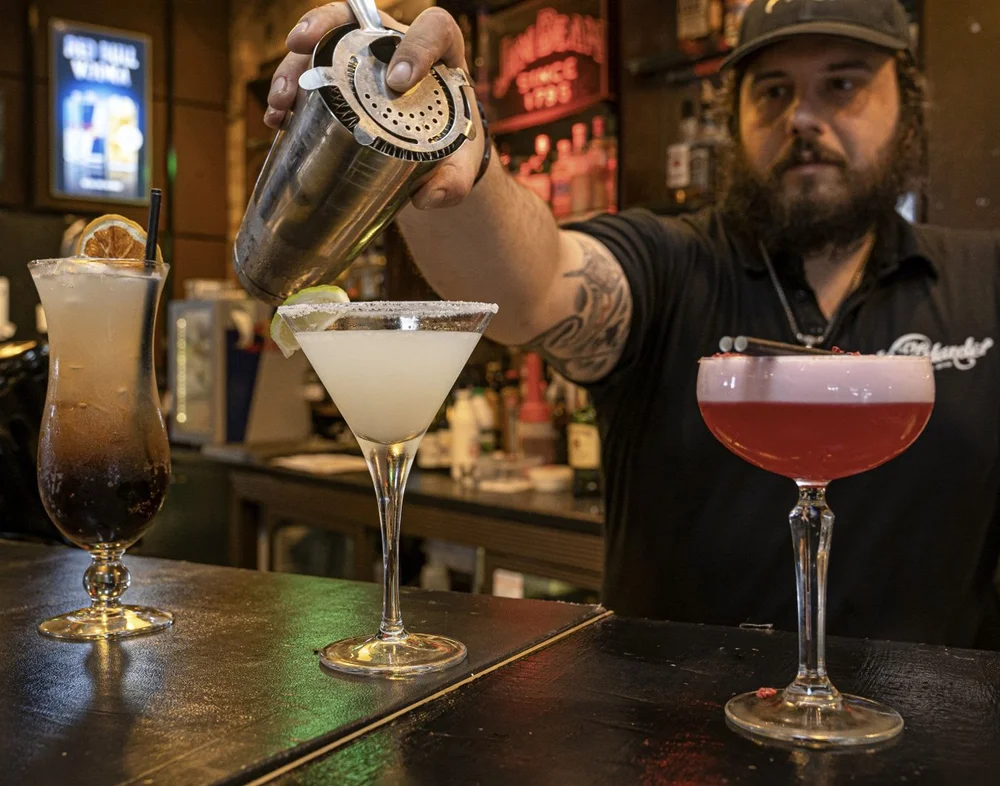 Bartender making cocktails at Nectar Bar