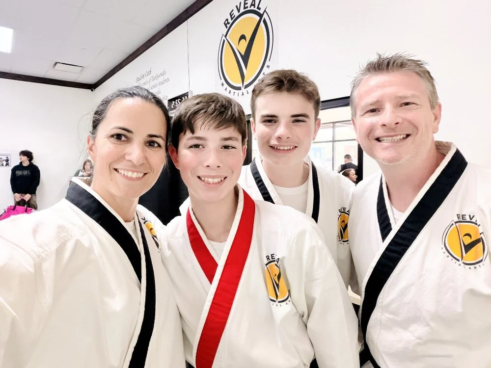 Family-owned Reveal Martial Arts instructors with teen students at the Southlake martial arts school, building confidence, discipline, and leadership through traditional martial arts.