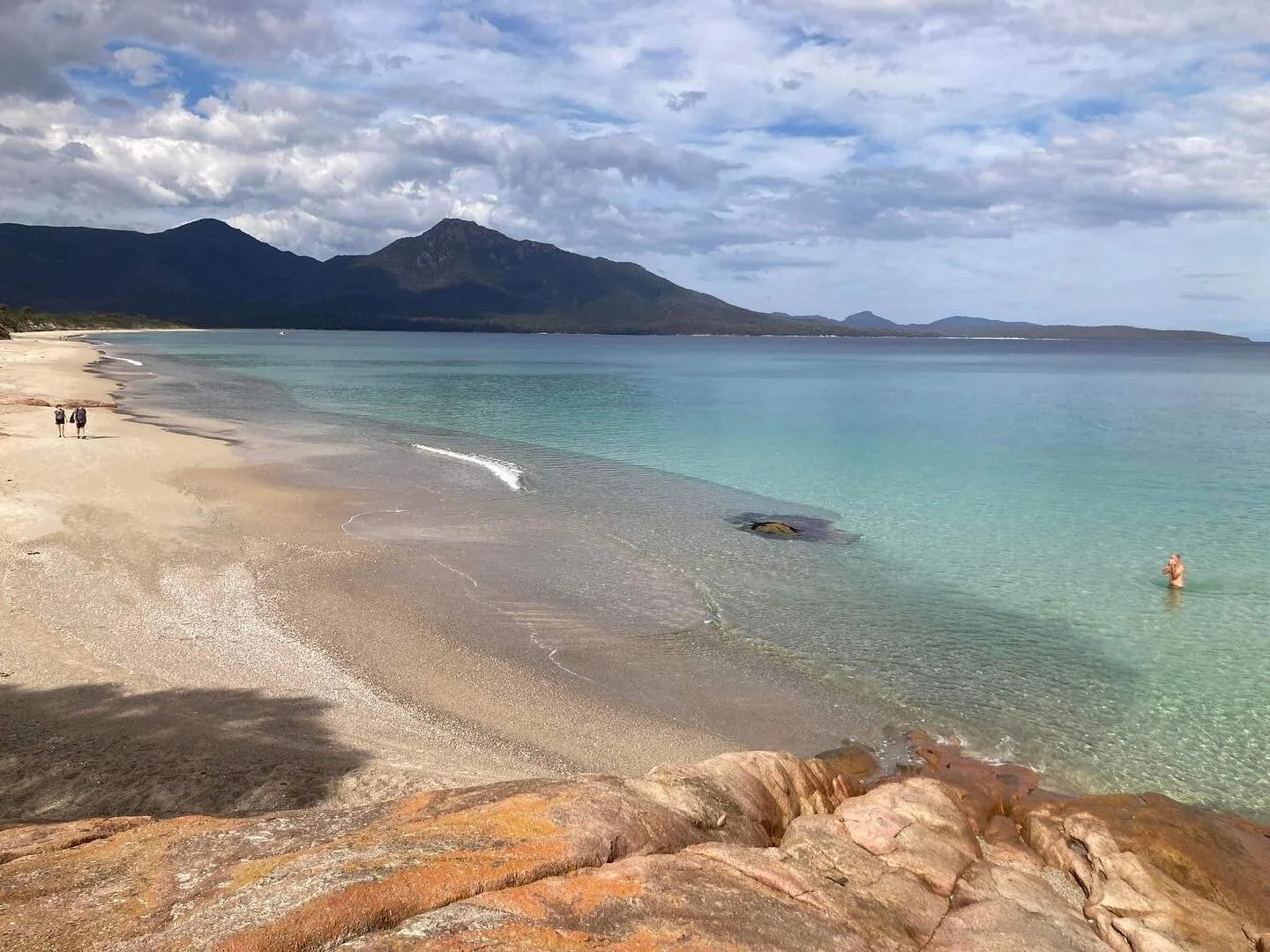Almost too beautiful to be real. 
Hazards Beach is a favourite among our guides; crystal clear water perfect for a dip, epic views of Mount Freycinet & Mount Graham, and often less trafficked. We often find we have the beach to ourselves —