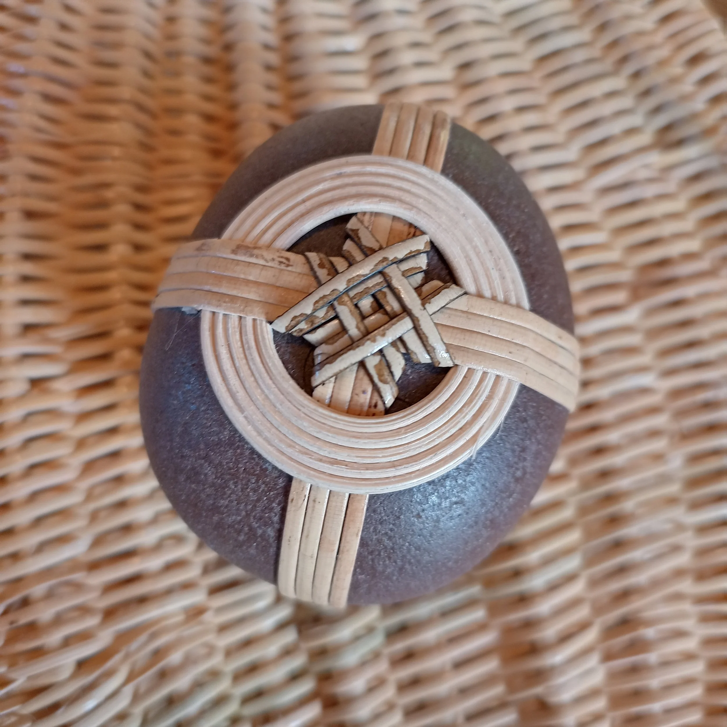Wrapped blessing stone by New Zealand basket maker Tanya Doty