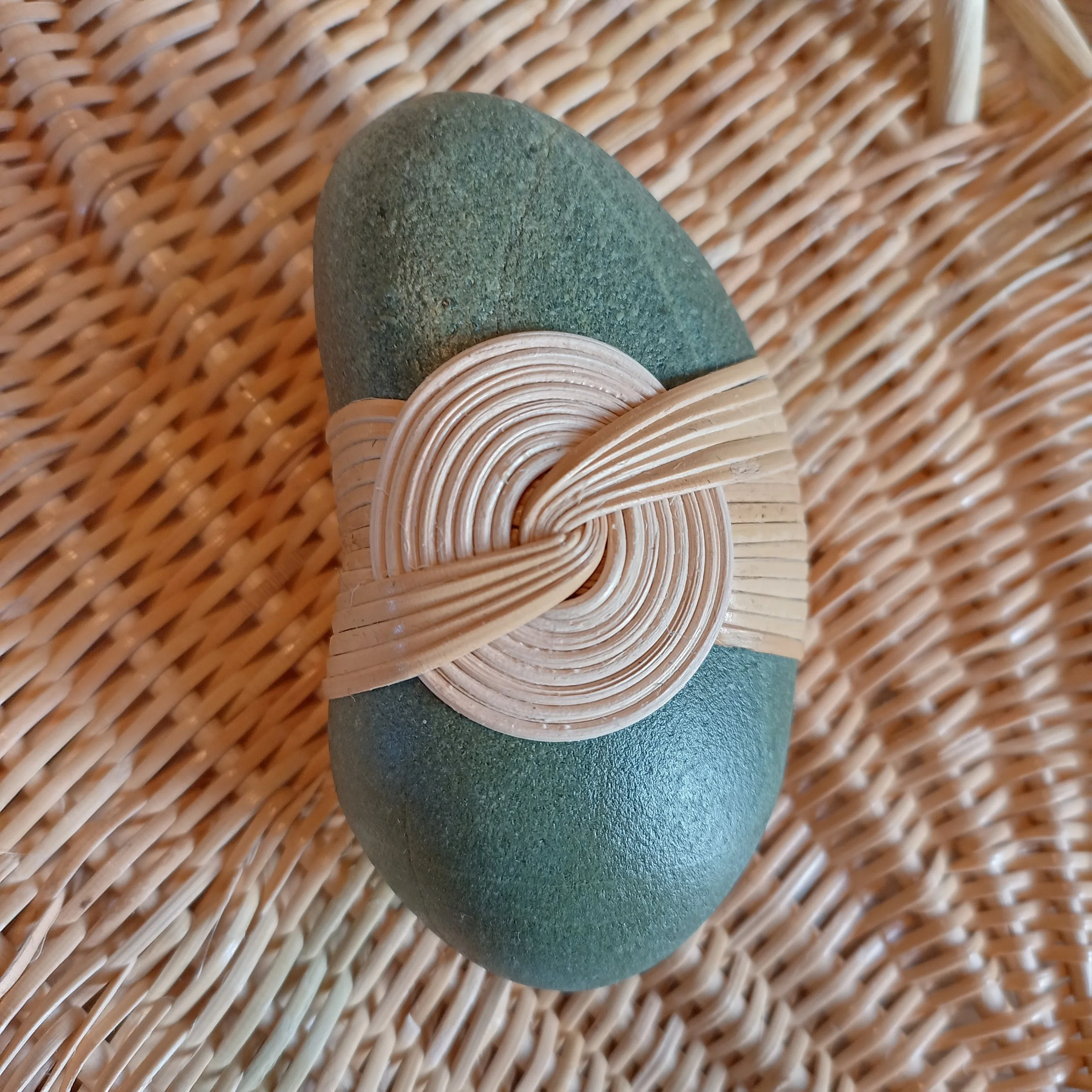 Hand wrapped stone by New Zealand Basket Maker Tanya Doty