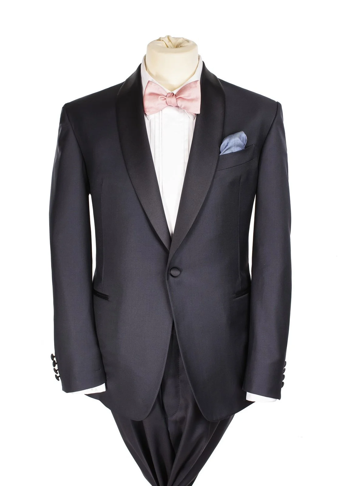 Midnight navy tuxedo jacket with satin shawl lapel, pink bow tie and pale blue pocket square
