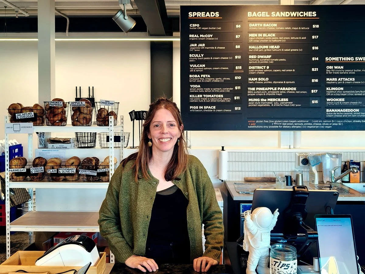 Owner Ellen working in the bagel store