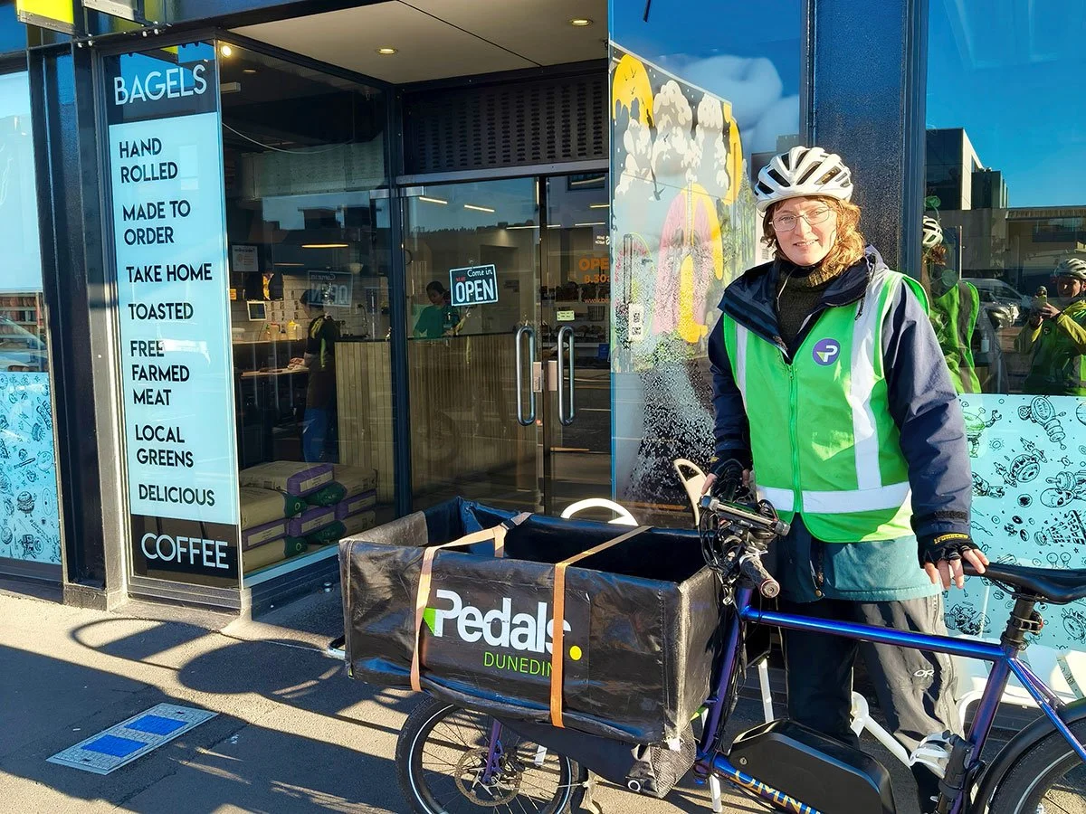 Pedals rider and bike outside Beam Me Up town store