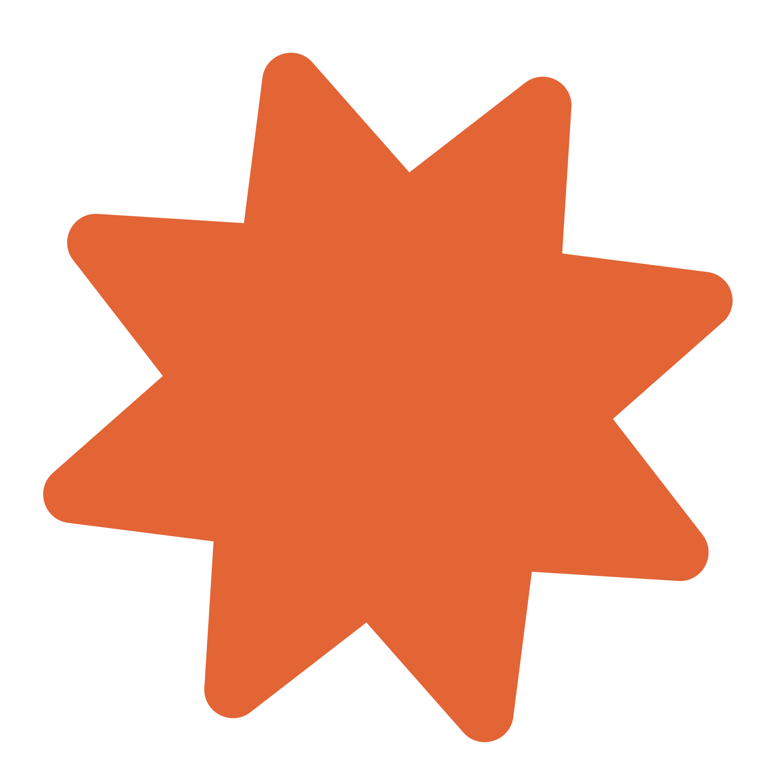 An orange irregular star shape on a black background.