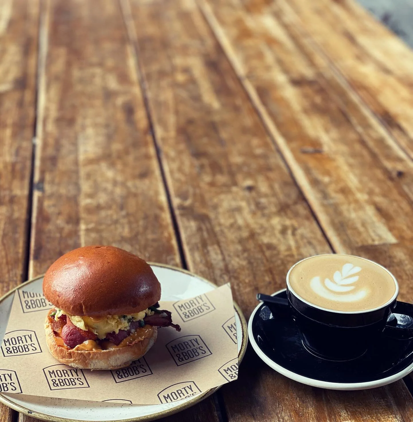 We used to do a brunch bun&hellip; but this one is better. Parmesan folded soft scrambled eggs with chives, crispy bacon, harissa mayo, Demi brioche. 🤤Everyday from 10.
