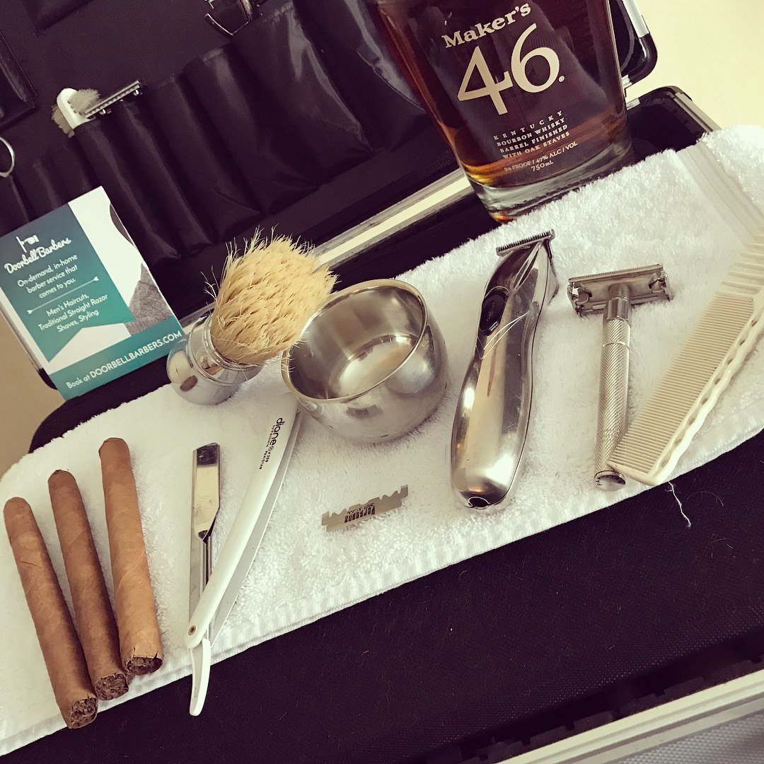 Barber tool kit with cigars and bourbon