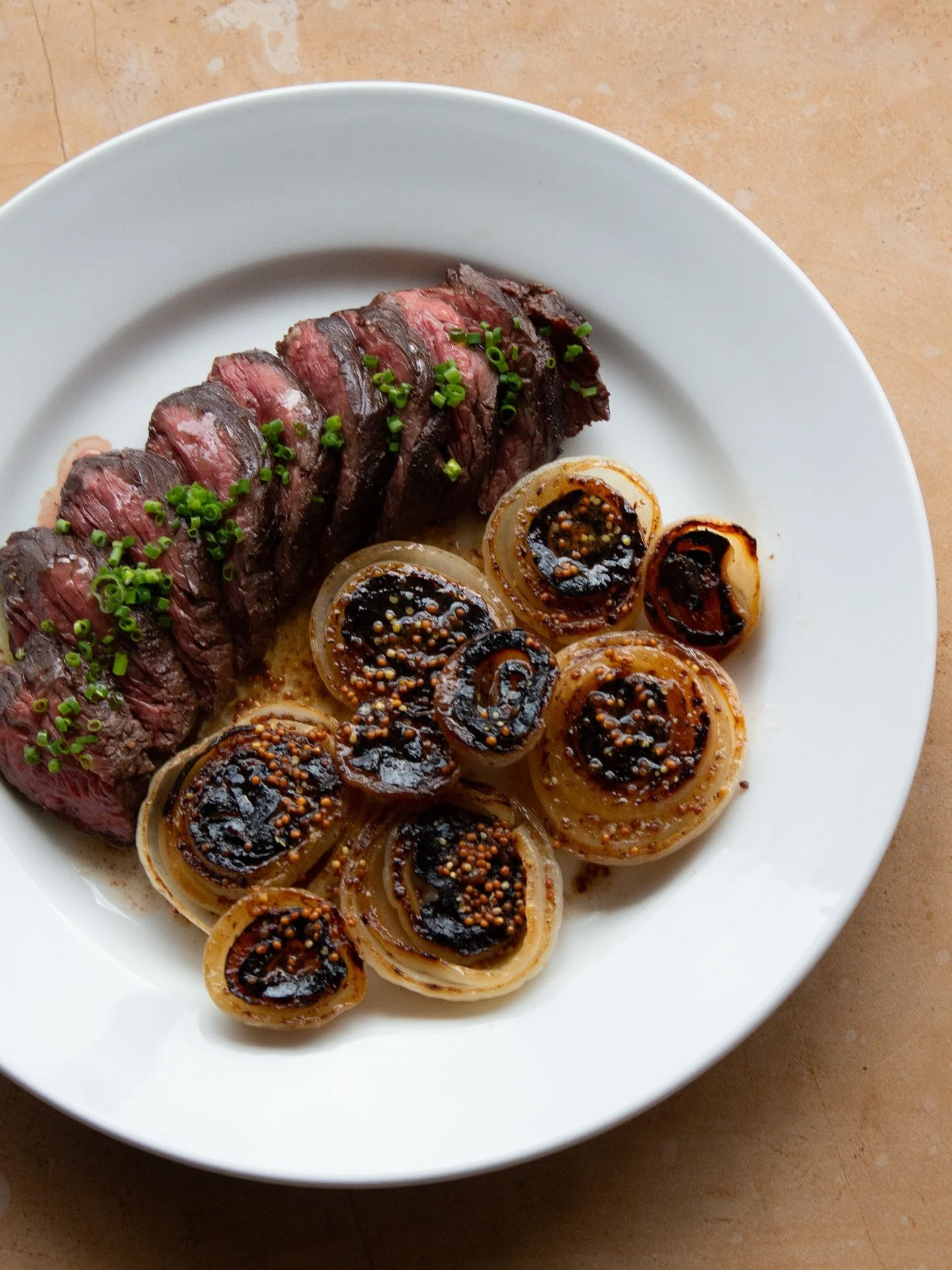 New fall dishes rolling out tonight at Margot: 
• 8oz hanger steak with braised then roasted cipollini onions served with a brown butter vinaigrette made with whole grain mustard
• Crispy branzino over sautéed escarole and marinate