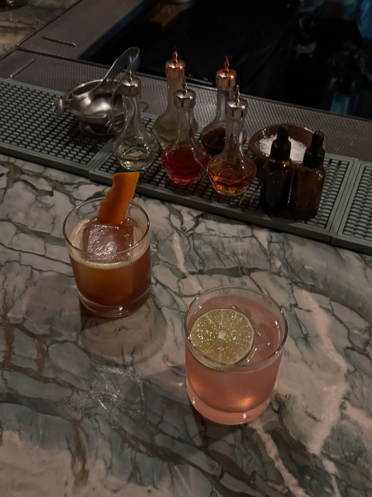 Two of our favorite cocktails on the menu right now, and the making of them:

&bull; Long Jacket &mdash; amaro, sweet vermouth, grapefruit liqueur, and olive brine. Bitttersweet and smooth. 

&bull; Blood Orange Margarita &mdash; tequila, blood orang
