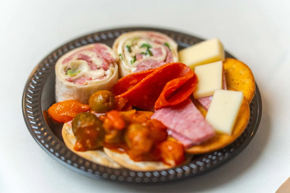Serving Stories Through Flavor: Our Visual Collaboration with Mama Russo’s Catering